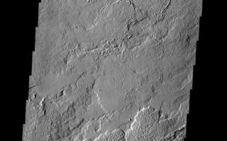 <h1>PIA08692:  Tharsis Lava Flows</h1><div class="PIA08692" lang="en" style="width:568px;text-align:left;margin:auto;background-color:#000;padding:10px;max-height:150px;overflow:auto;"><p><a href="/figures/PIA08692_fig1.jpg"></a><br><b>Context image for PIA08692<br />Tharsis Lava Flows></b></p><p>This image shows a small portion of the extensive Tharsis Volcanic Field. Several different surface textures are present in this image.</p><p>Image information: VIS instrument. Latitude 12.0N, Longitude 270.9E. 18 meter/pixel resolution.</p><p>Please see the <a href="http://themis.asu.edu/terms" target="_blank">THEMIS Data Citation Note</a> for details on crediting THEMIS images. </p><p>Note: this THEMIS visual image has not been radiometrically nor geometrically calibrated for this preliminary release. An empirical correction has been performed to remove instrumental effects. A linear shift has been applied in the cross-track and down-track direction to approximate spacecraft and planetary motion. Fully calibrated and geometrically projected images will be released through the Planetary Data System in accordance with Project policies at a later time.</p><p>NASA's Jet Propulsion Laboratory manages the 2001 Mars Odyssey mission for NASA's Office of Space Science, Washington, D.C. The Thermal Emission Imaging System (THEMIS) was developed by Arizona State University, Tempe, in collaboration with Raytheon Santa Barbara Remote Sensing. The THEMIS investigation is led by Dr. Philip Christensen at Arizona State University. Lockheed Martin Astronautics, Denver, is the prime contractor for the Odyssey project, and developed and built the orbiter. Mission operations are conducted jointly from Lockheed Martin and from JPL, a division of the California Institute of Technology in Pasadena.</p><br /><br /><a href="http://photojournal.jpl.nasa.gov/catalog/PIA08692" onclick="window.open(this.href); return false;" title="Voir l'image 	 PIA08692:  Tharsis Lava Flows	  sur le site de la NASA">Voir l'image 	 PIA08692:  Tharsis Lava Flows	  sur le site de la NASA.</a></div>