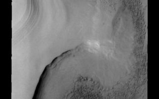 <h1>PIA08694:  Polar Dunes</h1><div class="PIA08694" lang="en" style="width:500px;text-align:left;margin:auto;background-color:#000;padding:10px;max-height:150px;overflow:auto;"><p><a href="/figures/PIA08694_fig1.jpg"></a><br><b>Context image for PIA08694<br />Polar Dunes></b></p><p>Dune fields are common within the north polar region.</p><p>Image information: VIS instrument. Latitude 83.6N, Longitude 120.3E. 40 meter/pixel resolution.</p><p>Please see the <a href="http://themis.asu.edu/terms" target="_blank">THEMIS Data Citation Note</a> for details on crediting THEMIS images. </p><p>Note: this THEMIS visual image has not been radiometrically nor geometrically calibrated for this preliminary release. An empirical correction has been performed to remove instrumental effects. A linear shift has been applied in the cross-track and down-track direction to approximate spacecraft and planetary motion. Fully calibrated and geometrically projected images will be released through the Planetary Data System in accordance with Project policies at a later time.</p><p>NASA's Jet Propulsion Laboratory manages the 2001 Mars Odyssey mission for NASA's Office of Space Science, Washington, D.C. The Thermal Emission Imaging System (THEMIS) was developed by Arizona State University, Tempe, in collaboration with Raytheon Santa Barbara Remote Sensing. The THEMIS investigation is led by Dr. Philip Christensen at Arizona State University. Lockheed Martin Astronautics, Denver, is the prime contractor for the Odyssey project, and developed and built the orbiter. Mission operations are conducted jointly from Lockheed Martin and from JPL, a division of the California Institute of Technology in Pasadena.</p><br /><br /><a href="http://photojournal.jpl.nasa.gov/catalog/PIA08694" onclick="window.open(this.href); return false;" title="Voir l'image 	 PIA08694:  Polar Dunes	  sur le site de la NASA">Voir l'image 	 PIA08694:  Polar Dunes	  sur le site de la NASA.</a></div>
