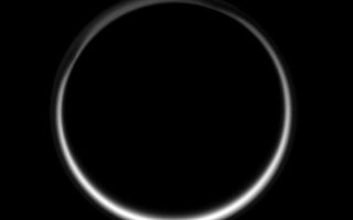 <h1>PIA09007:  Ring of Twilight</h1><div class="PIA09007" lang="en" style="width:712px;text-align:left;margin:auto;background-color:#000;padding:10px;max-height:150px;overflow:auto;"><p>This celestial circle of light is produced by the glow of sunlight scattered through the periphery of Titan's atmosphere as the Sun is occulted by Titan. It is the sum of all the sunsets and sunrises taking place on Titan at once.</p><p>The intriguing structure of Titan's north polar "hood" can be seen at upper left. A thin, detached, high-altitude global haze layer encircles the moon.</p><p>North on Titan (5,150 kilometers, 3,200 miles across) is up and rotated 23 degrees to the left.</p><p>The image was taken in visible blue light with the Cassini spacecraft wide-angle camera on June 29, 2007. The view was obtained at a distance of approximately 210,000 kilometers (131,000 miles) from Titan and at a Sun-Titan-spacecraft, or phase, angle of 167 degrees. Image scale is 12 kilometers (8 miles) per pixel.</p><p>The Cassini-Huygens mission is a cooperative project of NASA, the European Space Agency and the Italian Space Agency. The Jet Propulsion Laboratory, a division of the California Institute of Technology in Pasadena, manages the mission for NASA's Science Mission Directorate, Washington, D.C. The Cassini orbiter and its two onboard cameras were designed, developed and assembled at JPL. The imaging operations center is based at the Space Science Institute in Boulder, Colo.</p><p>For more information about the Cassini-Huygens mission visit <a href="http://saturn.jpl.nasa.gov">http://saturn.jpl.nasa.gov/home/index.cfm</a>. The Cassini imaging team homepage is at <a href="http://ciclops.org">http://ciclops.org</a>.</p><br /><br /><a href="http://photojournal.jpl.nasa.gov/catalog/PIA09007" onclick="window.open(this.href); return false;" title="Voir l'image 	 PIA09007:  Ring of Twilight	  sur le site de la NASA">Voir l'image 	 PIA09007:  Ring of Twilight	  sur le site de la NASA.</a></div>