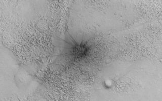 <h1>PIA09021:  Procedure for Finding New Impact Sites on Mars Using the Mars Global Surveyor Mars Orbiter Camera</h1><div class="PIA09021" lang="en" style="width:800px;text-align:left;margin:auto;background-color:#000;padding:10px;max-height:150px;overflow:auto;"><p><a href="/figures/PIA09021_fig1_anno.jpg"></a>Figure A<br /><a href="/figures/PIA09021_fig1_anno.jpg">Annotated Image</a></p><p><a href="/figures/PIA09021_fig2.jpg"></a><a href="/figures/PIA09021_fig3.jpg"></a>Figure B<br /><a href="/figures/PIA09021_fig2_anno.jpg">No Annotation</a>Figure C<br /><a href="/figures/PIA09021_fig3_anno.jpg">No Annotation</a><br /></p><p><a href="/figures/PIA09021_fig4.jpg"></a><a href="/figures/PIA09021_fig5_anno.jpg"></a>Figure D<br /><a href="/figures/PIA09021_fig4_anno.jpg">Annotated Image</a><br /><br />Figure E<br /><a href="/figures/PIA09021_fig5_anno.jpg">Annotated Image</a><br /><a href="/figures/PIA09021_fig5.jpg">No Annotation</a></p> <p>Having realized that a new dark spot on Mars, seen in a red wide angle camera image acquired on 6 January 2006, might be an indication of a recent meteor impact site  (see <a href="/catalog/PIA09020">PIA09020</a> or <a href="http://www.msss.com/mars_images/moc/2006/12/06/craters/site1/index.html">MOC2-1611</a>), the Mars Global Surveyor (MGS) Mars Orbiter Camera (MOC) science operations team considered it possible to find more such impact sites using the MOC red wide angle camera. The most recent, freshest craters would be expected to be quite small, ranging from a few meters across to maybe a few hundred meters or so, at most, in diameter (100 meters is about 109 yards; compare that with a 100 yard U.S.-style football field). Something less than 100 meters across would not show up easily in a 240 meters per pixel red wide angle image. But the 6 January 2006 image showed that it could, because these small impacts, if they occur in an area thickly mantled with dust, will create a much larger "blast zone" around them. </p><p>Thus, the MOC science operations team set out to image a few of the dustiest regions on Mars -- Tharsis, Amazonis, and Arabia -- with the red wide angle camera. The same camera had, in May and early June 1999, already imaged most of the planet at about 240 meters per pixel scale. By repeating areas already imaged in May/June 1999 during the January/March 2006 timeframe, we would be able to identify more dark spots. </p><p>And, so, that is what we did. The Tharsis, Amazonis, and Arabia regions were re-imaged using the MOC red wide angle camera during January through March 2006. The data covered about 21,506,000 square kilometers (~8.3 million square miles; ~1/3 the surface area of Mars and more than twice the area of the United States). As each picture was received on Earth, we compared it with the images acquired during May/June 1999. Over the entire area surveyed, we found 39 dark spots that were present in early 2006 but not visible in May/June 1999. </p><p>The 39 dark spots, then, were the candidate impact sites. Each one of these became a target for the MOC narrow angle camera, which would be used to take an image of about 1.5 meters (4.9 feet) per pixel of each site. The targets were entered into the MOC database. Then, as the predicted MGS ground track came near each site, the MOC team targeted an image by working with the spacecraft engineers at Lockheed Martin Astronautics (Denver, Colorado) and the Caltech/Jet Propulsion Laboratory (JPL, Pasadena, California) to point the spacecraft and camera at each site using the Roll Only Targeted Observation (ROTO) maneuver. </p><p>Of the 39 dark spots, 20 turned out to be fresh impact sites, and 19 of them were not. The other 19 included mistaken identifications (one was a transient, large dust devil shadow; several were craters that had been present in earlier images but had changed in brightness owing to dust removal), new dark wind streaks, and new dark slope streaks created by avalanching dust on steep slopes. </p><p>Some of the 20 new impact sites received further attention, as the spacecraft and MOC were used to obtain cPROTO (compensated Pitch and Roll Targeted Observations) views that have a spatial resolution of 0.5 meters (1.6 feet) in the downtrack dimension and 1.5 meters (4.9 feet) in the cross track direction. The cPROTO views, where obtained, have a higher resolution and better signal-to-noise ratio than the original ROTO images. </p><p>Finally, while our approach of comparing MOC red wide angle camera images obtained in May/June 1999 with those obtained in January/March 2006 constrains the 20 craters all to having formed during the May 1999 to March 2006 time interval, we found in all cases that there were already other images that had been received on Earth that helped constrain the time of the impact more tightly. In some cases, the date of the impact could be pinned down to within a month or two, in other cases the interval covered several years. Data from the MGS MOC, Mars Odyssey <a href="http://themis.asu.edu/" target="blank">Thermal Emission Imaging System (THEMIS)</a>, and Mars Express <a href="http://berlinadmin.dlr.de/Missions/express/indexeng.shtml" target="blank">High Resolution Stereo Camera (HRSC)</a> were all employed in the search. </p><p>Shown on this page (above) are pictures that illustrate our work to find new impact craters: </p><p>Figure A: This picture shows one of the new impact sites identified by the MOC team. Located in northern Arabia Terra near 29.3°N, 333.2°W, the actual crater is quite small, only 11.2 ± 3.0 meters in diameter. This is a sub-frame of MOC image S16-01105, acquired using a ROTO maneuver on 12 March 2006. </p><p>Figures B and C: These pictures are MOC red wide angle camera images, obtained at a scale of about 240 meters per pixel, of portions of Arabia Terra. Figure B is M01-01610 and was acquired during the MOC Geodesy Campaign (see PIA02022 and PIA02023, or MOC2-127) on 14 May 1999. Figure C, MOC S14-02741, was obtained on 26 January 2006 as part of the campaign to find new impact craters. By comparing the two images, one from 1999 and one from 2006, we were able to identify all new dark spots that formed during that interval. In this case, the new dark spot seen in the 2006 image, S14-02741, is inside the white circle. The same location is also indicated by a circle in the May 1999 image, but no dark spot is present there. In both cases, the white circle is about 12 km (7.5 mi) across. </p><p>Figure D: This map of Mars, showing the location of all the MOC red wide angle camera images acquired for the search for new craters during January through March 2006. These images cover most of Amazonis, Tharsis, and Arabia Terra. The base map is a product that combines the May/June 1999 MOC red wide angle data (plus later data for the south polar region) and laser altimeter data from MGS. </p><p>Figure E: This picture shows portions of two red wide angle camera context images that more tightly constrain when the new crater shown here (above, top, left) formed. The first picture, R05-00427, was acquired on 5 May 2003 and shows no dark spot at the site of the impact. The second picture, S05-01885, shows that the dark spot was present on 29 April 2005. Thus, these two images tell us that the impact occurred sometime between those dates: 5 May 2003 and 29 April 2005. </p><p>The Mars Global Surveyor mission is managed for NASA's Office of Space Science, Washington, by the Jet Propulsion Laboratory, a division of the California Institute of Technology, Pasadena. Lockheed Martin Space Systems, Denver, developed and operates the spacecraft. Malin Space Science Systems, San Diego, Calif., built and operates the Mars Orbiter Camera.</p><p>For more information about images from the Mars Orbiter Camera, see <a href="http://www.msss.com/mgs/moc/index.html">http://www.msss.com/mgs/moc/index.html</a>.</p><br /><br /><a href="http://photojournal.jpl.nasa.gov/catalog/PIA09021" onclick="window.open(this.href); return false;" title="Voir l'image 	 PIA09021:  Procedure for Finding New Impact Sites on Mars Using the Mars Global Surveyor Mars Orbiter Camera	  sur le site de la NASA">Voir l'image 	 PIA09021:  Procedure for Finding New Impact Sites on Mars Using the Mars Global Surveyor Mars Orbiter Camera	  sur le site de la NASA.</a></div>