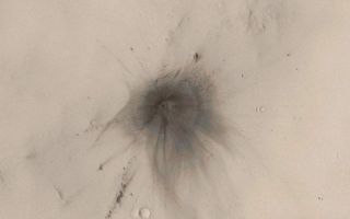 <h1>PIA09022:  New Impact Crater in Arabia Terra</h1><div class="PIA09022" lang="en" style="width:800px;text-align:left;margin:auto;background-color:#000;padding:10px;max-height:150px;overflow:auto;"><p><a href="/figures/PIA09022_fig1_anno.jpg"></a><a href="/figures/PIA09022_fig2.jpg"></a><a href="/figures/PIA09022_fig3_anno.jpg"></a>Figure A<a href="/figures/PIA09022_fig1_anno.jpg"><br />Annotated Image</a><br /><a href="/figures/PIA09022_fig1.jpg">No Annotation</a>Figure B<a href="/figures/PIA09022_fig2.jpg"><br /></a><a href="/figures/PIA09022_fig2.jpg">No Annotation</a><br /><br />Figure C<a href="/figures/PIA09022_fig3_anno.jpg"><br />Annotated Image</a><br /><a href="/figures/PIA09022_fig3.jpg">No Annotation</a></p></p>The images of new martian impact craters reveal many details about the impact event that result from the manner in which the impact process interacted with the dusty surface and thin planetary atmosphere; these data are sure to keep scientists busy for years. </p><p>Of the 20 new impact craters found on Mars by the Mars Global Surveyor (MGS) Mars Orbiter Camera (MOC) in 2006, the one shown here is perhaps the prettiest. The darkened "blast zone" around the crater exhibits considerable details about how the energy transferred from the impact to the surrounding atmosphere and dust-mantled surface interacted. Wispy dark rays and dark, annular (nearly-circular) zones surround the crater, while several chains of dark spots formed by secondary impact radiate away for hundreds of meters from the tiny crater. </p><p>This impact site has a single crater of about 22.6 ± 1.7 meters (about 75 feet) in diameter. Compare this with the typical 100 yard U.S.-style football field: 75 feet is about 24.7 yards. The crater is located in Arabia Terra near 26.4°N, 336.5°W. </p><p>This picture is a colorized view of the crater. The image is a sub-frame of MOC narrow angle camera image S16-01674, obtained on 20 March 2006. The color comes from a look-up table derived from the colors of Mars as seen by the Mars Reconnaissance Orbiter's <a href="http://berlinadmin.dlr.de/Missions/express/indexeng.shtml" target="blank">High Resolution Stereo Camera (HRSC)</a>. </p><p>Figures A and B: These pictures are grayscale composites of portions of MOC images S16-01674, S17-00795, S17-02191, and S18-01407, showing the impact site and the extensive rays developed during the impact event. These data were acquired during March, April, and May 2006. </p><p>Figure C: This picture shows how the age of the crater was constrained. The first (left) is a portion of MOC red wide angle camera image R12-00786, acquired on 8 December 2003. The white circle indicates the location of the impact site, but the impact had not yet occurred. The second picture (right) shows the same MOC red wide angle image, overlain by a portion of an image from the Mars Odyssey <a href="http://themis.asu.edu/" target="blank">Thermal Emission Imaging System (THEMIS)</a>. The THEMIS image is an infrared picture (I17523014, band 9, ~12.6 micrometers) acquired on 26 November 2005. In the infrared image, the impact site shows up as a bright spot because it is warmer than its surroundings during the day. These two pictures, thus, tell us that the impact occurred some time between 8 December 2003 and 26 November 2005. </p><p>The Mars Global Surveyor mission is managed for NASA's Office of Space Science, Washington, by the Jet Propulsion Laboratory, a division of the California Institute of Technology, Pasadena. Lockheed Martin Space Systems, Denver, developed and operates the spacecraft. Malin Space Science Systems, San Diego, Calif., built and operates the Mars Orbiter Camera.</p><p>For more information about images from the Mars Orbiter Camera, see <a href="http://www.msss.com/mgs/moc/index.html">http://www.msss.com/mgs/moc/index.html</a>.</p><br /><br /><a href="http://photojournal.jpl.nasa.gov/catalog/PIA09022" onclick="window.open(this.href); return false;" title="Voir l'image 	 PIA09022:  New Impact Crater in Arabia Terra	  sur le site de la NASA">Voir l'image 	 PIA09022:  New Impact Crater in Arabia Terra	  sur le site de la NASA.</a></div>