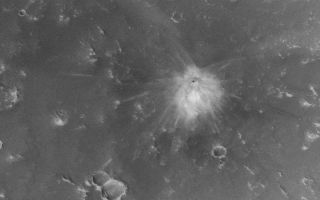 <h1>PIA09025:  Fresh Crater in Arabia Terra with Light-Toned Ejecta</h1><div class="PIA09025" lang="en" style="width:800px;text-align:left;margin:auto;background-color:#000;padding:10px;max-height:150px;overflow:auto;"><p> <a href="/figures/PIA09025_fig1_anno.jpg"></a> <a href="/figures/PIA09025_fig2_anno.jpg"></a>Figure A<br /> <a href="/figures/PIA09025_fig1_anno.jpg">Annotated Image</a><br /><br />Figure B<br /> <a href="/figures/PIA09025_fig2_anno.jpg">Annotated Image</a><br /> <a href="/figures/PIA09025_fig2.jpg">No Annotation</a></p><p> <a href="/figures/PIA09025_fig3_anno.jpg"></a>Figure C<br /> <a href="/figures/PIA09025_fig3_anno.jpg">Annotated Image</a><br /> <a href="/figures/PIA09025_fig3.jpg">No Annotation</a></p><p>While most of the new impact craters found on Mars by the Mars Global Surveyor's Mars Orbiter Camera have dark ejecta patterns, a few of them also have light-toned ejecta, indicating that the impacting meteorite excavated to a depth where a light-toned material was present. </p><p>Figure A: The picture was acquired on Feb. 26, 2006. The single small crater of about 22.6 meters (about 74 feet) in diameter is surrounded by light and dark-toned ejecta. The crater occurs near 20.6 degrees north latitude, 356.8 degrees west longitude, in Arabia Terra. </p><p>Figure B: This set of images shows how the impact site appeared to the Mars Odyssey Thermal Emission Imaging System infrared instrument before and after the impact. The white circle indicates the location of the impact site. Both images are from the Thermal Emission Imaging System band 9 (approximately 12.6 micrometers wavelength); the first image was obtained on June 30, 2002, the second on Oct. 5, 2003. In the 2003 image, the impact site appears as a bright spot, because it was warmer than the surroundings at the time the data were acquired. </p><p>Figure C: The final figure shows how the impact site appeared to the Mars Global Surveyor Mars Orbiter wide-angle cameras. The first image shows the site before the impact, on Aug. 31, 1999. The second shows the impact site as it appeared on May 7, 2003. </p><p>Taken together, the Mars Odyssey and Mars Global Surveyor data indicate that this impact occurred some time between June 30, 2002, and May 7, 2003. </p><p>The Mars Global Surveyor mission is managed for NASA's Office of Space Science, Washington, by NASA's Jet Propulsion Laboratory, Pasadena, Calif., a division of the California Institute of Technology, also in Pasadena. Lockheed Martin Space Systems, Denver, developed and operates the spacecraft. Malin Space Science Systems, San Diego, Calif., built and operates the Mars Orbiter Camera.</p><p>For more information about images from the Mars Orbiter Camera, see <a href="http://www.msss.com/mgs/moc/index.html">http://www.msss.com/mgs/moc/index.html</a>.</p><br /><br /><a href="http://photojournal.jpl.nasa.gov/catalog/PIA09025" onclick="window.open(this.href); return false;" title="Voir l'image 	 PIA09025:  Fresh Crater in Arabia Terra with Light-Toned Ejecta	  sur le site de la NASA">Voir l'image 	 PIA09025:  Fresh Crater in Arabia Terra with Light-Toned Ejecta	  sur le site de la NASA.</a></div>