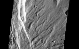 <h1>PIA09055:  Acheron Fossae</h1><div class="PIA09055" lang="en" style="width:549px;text-align:left;margin:auto;background-color:#000;padding:10px;max-height:150px;overflow:auto;"><p><a href="/figures/PIA09055_fig1.jpg"></a><br><b>Context image for PIA09055<br />Acheron Fossae</b></p><p>This faulted and eroded surface is part of Acheron Fossae.<p>Image information: VIS instrument. Latitude 36.5N, Longitude 229.7E. 19 meter/pixel resolution.</p><p>Please see the <a href="http://themis.asu.edu/terms" target="_blank">THEMIS Data Citation Note</a> for details on crediting THEMIS images.</p><p>Note: this THEMIS visual image has not been radiometrically nor geometrically calibrated for this preliminary release. An empirical correction has been performed to remove instrumental effects. A linear shift has been applied in the cross-track and down-track direction to approximate spacecraft and planetary motion. Fully calibrated and geometrically projected images will be released through the Planetary Data System in accordance with Project policies at a later time.</p><p>NASA's Jet Propulsion Laboratory manages the 2001 Mars Odyssey mission for NASA's Office of Space Science, Washington, D.C. The Thermal Emission Imaging System (THEMIS) was developed by Arizona State University, Tempe, in collaboration with Raytheon Santa Barbara Remote Sensing. The THEMIS investigation is led by Dr. Philip Christensen at Arizona State University. Lockheed Martin Astronautics, Denver, is the prime contractor for the Odyssey project, and developed and built the orbiter. Mission operations are conducted jointly from Lockheed Martin and from JPL, a division of the California Institute of Technology in Pasadena.</p><br /><br /><a href="http://photojournal.jpl.nasa.gov/catalog/PIA09055" onclick="window.open(this.href); return false;" title="Voir l'image 	 PIA09055:  Acheron Fossae	  sur le site de la NASA">Voir l'image 	 PIA09055:  Acheron Fossae	  sur le site de la NASA.</a></div>