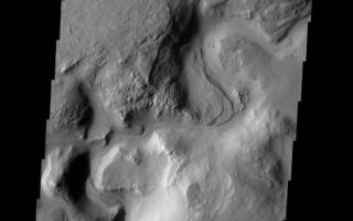 <h1>PIA09056:  Auqakuh Vallis</h1><div class="PIA09056" lang="en" style="width:547px;text-align:left;margin:auto;background-color:#000;padding:10px;max-height:150px;overflow:auto;"><p><a href="/figures/PIA09056_fig1.jpg"></a><br><b>Context image for PIA09056<br />Auqakuh Vallis</b></p><p>A portion of Auqakuh Vallis is shown in this image.<p>Image information: VIS instrument. Latitude 32.4N, Longitude 61.8E. 19 meter/pixel resolution.</p><p>Please see the <a href="http://themis.asu.edu/terms" target="_blank">THEMIS Data Citation Note</a> for details on crediting THEMIS images.</p><p>Note: this THEMIS visual image has not been radiometrically nor geometrically calibrated for this preliminary release. An empirical correction has been performed to remove instrumental effects. A linear shift has been applied in the cross-track and down-track direction to approximate spacecraft and planetary motion. Fully calibrated and geometrically projected images will be released through the Planetary Data System in accordance with Project policies at a later time.</p><p>NASA's Jet Propulsion Laboratory manages the 2001 Mars Odyssey mission for NASA's Office of Space Science, Washington, D.C. The Thermal Emission Imaging System (THEMIS) was developed by Arizona State University, Tempe, in collaboration with Raytheon Santa Barbara Remote Sensing. The THEMIS investigation is led by Dr. Philip Christensen at Arizona State University. Lockheed Martin Astronautics, Denver, is the prime contractor for the Odyssey project, and developed and built the orbiter. Mission operations are conducted jointly from Lockheed Martin and from JPL, a division of the California Institute of Technology in Pasadena.</p><br /><br /><a href="http://photojournal.jpl.nasa.gov/catalog/PIA09056" onclick="window.open(this.href); return false;" title="Voir l'image 	 PIA09056:  Auqakuh Vallis	  sur le site de la NASA">Voir l'image 	 PIA09056:  Auqakuh Vallis	  sur le site de la NASA.</a></div>