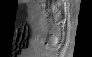 <h1>PIA09064:  Dunes</h1><div class="PIA09064" lang="en" style="width:512px;text-align:left;margin:auto;background-color:#000;padding:10px;max-height:150px;overflow:auto;"><p><a href="/figures/PIA09064_fig1.jpg"></a><br><b>Context image for PIA09064<br />Dunes</b></p><p>These dark sand dunes are located in an unnamed crater in Noachis Terra.<p>Image information: VIS instrument. Latitude -43.3N, Longitude 17.9E. 17 meter/pixel resolution.</p><p>Please see the <a href="http://themis.asu.edu/terms" target="_blank">THEMIS Data Citation Note</a> for details on crediting THEMIS images.</p><p>Note: this THEMIS visual image has not been radiometrically nor geometrically calibrated for this preliminary release. An empirical correction has been performed to remove instrumental effects. A linear shift has been applied in the cross-track and down-track direction to approximate spacecraft and planetary motion. Fully calibrated and geometrically projected images will be released through the Planetary Data System in accordance with Project policies at a later time.</p><p>NASA's Jet Propulsion Laboratory manages the 2001 Mars Odyssey mission for NASA's Office of Space Science, Washington, D.C. The Thermal Emission Imaging System (THEMIS) was developed by Arizona State University, Tempe, in collaboration with Raytheon Santa Barbara Remote Sensing. The THEMIS investigation is led by Dr. Philip Christensen at Arizona State University. Lockheed Martin Astronautics, Denver, is the prime contractor for the Odyssey project, and developed and built the orbiter. Mission operations are conducted jointly from Lockheed Martin and from JPL, a division of the California Institute of Technology in Pasadena.</p><br /><br /><a href="http://photojournal.jpl.nasa.gov/catalog/PIA09064" onclick="window.open(this.href); return false;" title="Voir l'image 	 PIA09064:  Dunes	  sur le site de la NASA">Voir l'image 	 PIA09064:  Dunes	  sur le site de la NASA.</a></div>