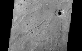 <h1>PIA09067:  Lava Flows</h1><div class="PIA09067" lang="en" style="width:522px;text-align:left;margin:auto;background-color:#000;padding:10px;max-height:150px;overflow:auto;"><p><a href="/figures/PIA09067_fig1.jpg"></a><br><b>Context image for PIA09067<br />Lava Flows</b></p><p>These lava flows surrounding a depression in the plains are located in the Cerberus region of Elysium Planitia.<p>Image information: VIS instrument. Latitude 4.6N, Longitude 158.9E. 18 meter/pixel resolution.</p><p>Please see the <a href="http://themis.asu.edu/terms" target="_blank">THEMIS Data Citation Note</a> for details on crediting THEMIS images.</p><p>Note: this THEMIS visual image has not been radiometrically nor geometrically calibrated for this preliminary release. An empirical correction has been performed to remove instrumental effects. A linear shift has been applied in the cross-track and down-track direction to approximate spacecraft and planetary motion. Fully calibrated and geometrically projected images will be released through the Planetary Data System in accordance with Project policies at a later time.</p><p>NASA's Jet Propulsion Laboratory manages the 2001 Mars Odyssey mission for NASA's Office of Space Science, Washington, D.C. The Thermal Emission Imaging System (THEMIS) was developed by Arizona State University, Tempe, in collaboration with Raytheon Santa Barbara Remote Sensing. The THEMIS investigation is led by Dr. Philip Christensen at Arizona State University. Lockheed Martin Astronautics, Denver, is the prime contractor for the Odyssey project, and developed and built the orbiter. Mission operations are conducted jointly from Lockheed Martin and from JPL, a division of the California Institute of Technology in Pasadena.</p><br /><br /><a href="http://photojournal.jpl.nasa.gov/catalog/PIA09067" onclick="window.open(this.href); return false;" title="Voir l'image 	 PIA09067:  Lava Flows	  sur le site de la NASA">Voir l'image 	 PIA09067:  Lava Flows	  sur le site de la NASA.</a></div>