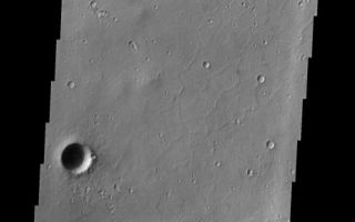 <h1>PIA09125:  Tiu Vallis</h1><div class="PIA09125" lang="en" style="width:529px;text-align:left;margin:auto;background-color:#000;padding:10px;max-height:150px;overflow:auto;"><p><a href="/figures/PIA09125_fig1.jpg"></a><br><b>Context image for PIA09125<br /> Tiu Vallis</b></p><p>This image shows a small landslide on the northern margin of Tiu Vallis.<p>Image information: VIS instrument. Latitude 5.5N, Longitude 327.9E. 18 meter/pixel resolution.</p><p>Please see the <a href="http://themis.asu.edu/terms" target="_blank">THEMIS Data Citation Note</a> for details on crediting THEMIS images.</p><p>Note: this THEMIS visual image has not been radiometrically nor geometrically calibrated for this preliminary release. An empirical correction has been performed to remove instrumental effects. A linear shift has been applied in the cross-track and down-track direction to approximate spacecraft and planetary motion. Fully calibrated and geometrically projected images will be released through the Planetary Data System in accordance with Project policies at a later time.</p><p>NASA's Jet Propulsion Laboratory manages the 2001 Mars Odyssey mission for NASA's Office of Space Science, Washington, D.C. The Thermal Emission Imaging System (THEMIS) was developed by Arizona State University, Tempe, in collaboration with Raytheon Santa Barbara Remote Sensing. The THEMIS investigation is led by Dr. Philip Christensen at Arizona State University. Lockheed Martin Astronautics, Denver, is the prime contractor for the Odyssey project, and developed and built the orbiter. Mission operations are conducted jointly from Lockheed Martin and from JPL, a division of the California Institute of Technology in Pasadena.</p><br /><br /><a href="http://photojournal.jpl.nasa.gov/catalog/PIA09125" onclick="window.open(this.href); return false;" title="Voir l'image 	 PIA09125:  Tiu Vallis	  sur le site de la NASA">Voir l'image 	 PIA09125:  Tiu Vallis	  sur le site de la NASA.</a></div>