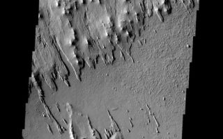 <h1>PIA09126:  Yardangs</h1><div class="PIA09126" lang="en" style="width:528px;text-align:left;margin:auto;background-color:#000;padding:10px;max-height:150px;overflow:auto;"><p><a href="/figures/PIA09126_fig1.jpg"></a><br><b>Context image for PIA09126<br /> Yardangs</b></p><p>These yardangs - wind eroded ridges - are part of Eumenides Dorsum.<p>Image information: VIS instrument. Latitude 8.2N, Longitude 203.8E. 18 meter/pixel resolution.</p><p>Please see the <a href="http://themis.asu.edu/terms" target="_blank">THEMIS Data Citation Note</a> for details on crediting THEMIS images.</p><p>Note: this THEMIS visual image has not been radiometrically nor geometrically calibrated for this preliminary release. An empirical correction has been performed to remove instrumental effects. A linear shift has been applied in the cross-track and down-track direction to approximate spacecraft and planetary motion. Fully calibrated and geometrically projected images will be released through the Planetary Data System in accordance with Project policies at a later time.</p><p>NASA's Jet Propulsion Laboratory manages the 2001 Mars Odyssey mission for NASA's Office of Space Science, Washington, D.C. The Thermal Emission Imaging System (THEMIS) was developed by Arizona State University, Tempe, in collaboration with Raytheon Santa Barbara Remote Sensing. The THEMIS investigation is led by Dr. Philip Christensen at Arizona State University. Lockheed Martin Astronautics, Denver, is the prime contractor for the Odyssey project, and developed and built the orbiter. Mission operations are conducted jointly from Lockheed Martin and from JPL, a division of the California Institute of Technology in Pasadena.</p><br /><br /><a href="http://photojournal.jpl.nasa.gov/catalog/PIA09126" onclick="window.open(this.href); return false;" title="Voir l'image 	 PIA09126:  Yardangs	  sur le site de la NASA">Voir l'image 	 PIA09126:  Yardangs	  sur le site de la NASA.</a></div>