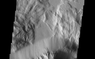 <h1>PIA09128:  Olympus Mons</h1><div class="PIA09128" lang="en" style="width:540px;text-align:left;margin:auto;background-color:#000;padding:10px;max-height:150px;overflow:auto;"><p><a href="/figures/PIA09128_fig1.jpg"></a><br><b>Context image for PIA09128<br /> Olympus Mons</b></p><p>This spectacular image of the northern escarpment of Olympus Mons contains many different features. Lava flows are visible at the bottom of the frame. Faulting occurs at the edge of the escarpment. North of the escarpment are two large landslides and then the rugged material of Lycus Sulci.<p>Image information: VIS instrument. Latitude 23.3N, Longitude 228.3E. 19 meter/pixel resolution.</p><p>Please see the <a href="http://themis.asu.edu/terms" target="_blank">THEMIS Data Citation Note</a> for details on crediting THEMIS images.</p><p>Note: this THEMIS visual image has not been radiometrically nor geometrically calibrated for this preliminary release. An empirical correction has been performed to remove instrumental effects. A linear shift has been applied in the cross-track and down-track direction to approximate spacecraft and planetary motion. Fully calibrated and geometrically projected images will be released through the Planetary Data System in accordance with Project policies at a later time.</p><p>NASA's Jet Propulsion Laboratory manages the 2001 Mars Odyssey mission for NASA's Office of Space Science, Washington, D.C. The Thermal Emission Imaging System (THEMIS) was developed by Arizona State University, Tempe, in collaboration with Raytheon Santa Barbara Remote Sensing. The THEMIS investigation is led by Dr. Philip Christensen at Arizona State University. Lockheed Martin Astronautics, Denver, is the prime contractor for the Odyssey project, and developed and built the orbiter. Mission operations are conducted jointly from Lockheed Martin and from JPL, a division of the California Institute of Technology in Pasadena.</p><br /><br /><a href="http://photojournal.jpl.nasa.gov/catalog/PIA09128" onclick="window.open(this.href); return false;" title="Voir l'image 	 PIA09128:  Olympus Mons	  sur le site de la NASA">Voir l'image 	 PIA09128:  Olympus Mons	  sur le site de la NASA.</a></div>