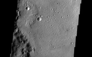 <h1>PIA09131:  Landslides</h1><div class="PIA09131" lang="en" style="width:517px;text-align:left;margin:auto;background-color:#000;padding:10px;max-height:150px;overflow:auto;"><p><a href="/figures/PIA09131_fig1.jpg"></a><br><b>Context image for PIA09131<br /> Landslides</b></p><p>The three landslides in this image are located within an unnamed crater in Noachis Terra.<p>Image information: VIS instrument. Latitude -31.3N, Longitude 349.0E. 17 meter/pixel resolution.</p><p>Please see the <a href="http://themis.asu.edu/terms" target="_blank">THEMIS Data Citation Note</a> for details on crediting THEMIS images.</p><p>Note: this THEMIS visual image has not been radiometrically nor geometrically calibrated for this preliminary release. An empirical correction has been performed to remove instrumental effects. A linear shift has been applied in the cross-track and down-track direction to approximate spacecraft and planetary motion. Fully calibrated and geometrically projected images will be released through the Planetary Data System in accordance with Project policies at a later time.</p><p>NASA's Jet Propulsion Laboratory manages the 2001 Mars Odyssey mission for NASA's Office of Space Science, Washington, D.C. The Thermal Emission Imaging System (THEMIS) was developed by Arizona State University, Tempe, in collaboration with Raytheon Santa Barbara Remote Sensing. The THEMIS investigation is led by Dr. Philip Christensen at Arizona State University. Lockheed Martin Astronautics, Denver, is the prime contractor for the Odyssey project, and developed and built the orbiter. Mission operations are conducted jointly from Lockheed Martin and from JPL, a division of the California Institute of Technology in Pasadena.</p><br /><br /><a href="http://photojournal.jpl.nasa.gov/catalog/PIA09131" onclick="window.open(this.href); return false;" title="Voir l'image 	 PIA09131:  Landslides	  sur le site de la NASA">Voir l'image 	 PIA09131:  Landslides	  sur le site de la NASA.</a></div>