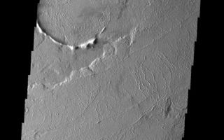 <h1>PIA09133:  Lava Flows</h1><div class="PIA09133" lang="en" style="width:571px;text-align:left;margin:auto;background-color:#000;padding:10px;max-height:150px;overflow:auto;"><p><a href="/figures/PIA09133_fig1.jpg"></a><br><b>Context image for PIA09133<br /> Lava Flows</b></p><p>These lava flows are located to the northeast of Tharsis Tholus.<p>Image information: VIS instrument. Latitude 17.1N, Longitude 271.5E. 18 meter/pixel resolution.</p><p>Please see the <a href="http://themis.asu.edu/terms" target="_blank">THEMIS Data Citation Note</a> for details on crediting THEMIS images.</p><p>Note: this THEMIS visual image has not been radiometrically nor geometrically calibrated for this preliminary release. An empirical correction has been performed to remove instrumental effects. A linear shift has been applied in the cross-track and down-track direction to approximate spacecraft and planetary motion. Fully calibrated and geometrically projected images will be released through the Planetary Data System in accordance with Project policies at a later time.</p><p>NASA's Jet Propulsion Laboratory manages the 2001 Mars Odyssey mission for NASA's Office of Space Science, Washington, D.C. The Thermal Emission Imaging System (THEMIS) was developed by Arizona State University, Tempe, in collaboration with Raytheon Santa Barbara Remote Sensing. The THEMIS investigation is led by Dr. Philip Christensen at Arizona State University. Lockheed Martin Astronautics, Denver, is the prime contractor for the Odyssey project, and developed and built the orbiter. Mission operations are conducted jointly from Lockheed Martin and from JPL, a division of the California Institute of Technology in Pasadena.</p><br /><br /><a href="http://photojournal.jpl.nasa.gov/catalog/PIA09133" onclick="window.open(this.href); return false;" title="Voir l'image 	 PIA09133:  Lava Flows	  sur le site de la NASA">Voir l'image 	 PIA09133:  Lava Flows	  sur le site de la NASA.</a></div>