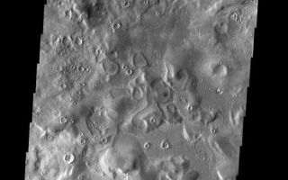 <h1>PIA09134:  Young Crater</h1><div class="PIA09134" lang="en" style="width:591px;text-align:left;margin:auto;background-color:#000;padding:10px;max-height:150px;overflow:auto;"><p><a href="/figures/PIA09134_fig1.jpg"></a><br><b>Context image for PIA09134<br /> Young Crater</b></p><p>This unnamed crater is noticeably younger than the other craters in this image. Note the easily identifiable ejecta blanket. This crater is located in the Phlegra Montes.<p>Image information: VIS instrument. Latitude 39.3N, Longitude 160.6E. 19 meter/pixel resolution.</p><p>Please see the <a href="http://themis.asu.edu/terms" target="_blank">THEMIS Data Citation Note</a> for details on crediting THEMIS images.</p><p>Note: this THEMIS visual image has not been radiometrically nor geometrically calibrated for this preliminary release. An empirical correction has been performed to remove instrumental effects. A linear shift has been applied in the cross-track and down-track direction to approximate spacecraft and planetary motion. Fully calibrated and geometrically projected images will be released through the Planetary Data System in accordance with Project policies at a later time.</p><p>NASA's Jet Propulsion Laboratory manages the 2001 Mars Odyssey mission for NASA's Office of Space Science, Washington, D.C. The Thermal Emission Imaging System (THEMIS) was developed by Arizona State University, Tempe, in collaboration with Raytheon Santa Barbara Remote Sensing. The THEMIS investigation is led by Dr. Philip Christensen at Arizona State University. Lockheed Martin Astronautics, Denver, is the prime contractor for the Odyssey project, and developed and built the orbiter. Mission operations are conducted jointly from Lockheed Martin and from JPL, a division of the California Institute of Technology in Pasadena.</p><br /><br /><a href="http://photojournal.jpl.nasa.gov/catalog/PIA09134" onclick="window.open(this.href); return false;" title="Voir l'image 	 PIA09134:  Young Crater	  sur le site de la NASA">Voir l'image 	 PIA09134:  Young Crater	  sur le site de la NASA.</a></div>