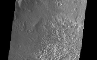 <h1>PIA09136:  Large Crater</h1><div class="PIA09136" lang="en" style="width:594px;text-align:left;margin:auto;background-color:#000;padding:10px;max-height:150px;overflow:auto;"><p><a href="/figures/PIA09136_fig1.jpg"></a><br><b>Context image for PIA09136<br /> Large Crater</b></p><p>This image shows part of the large unnamed crater located on Acheron Fossae. Numerous channels dissect the crater rim and the crater floor has a rugged texture.<p>Image information: VIS instrument. Latitude 39.4N, Longitude 224.5E. 19 meter/pixel resolution.</p><p>Please see the <a href="http://themis.asu.edu/terms" target="_blank">THEMIS Data Citation Note</a> for details on crediting THEMIS images.</p><p>Note: this THEMIS visual image has not been radiometrically nor geometrically calibrated for this preliminary release. An empirical correction has been performed to remove instrumental effects. A linear shift has been applied in the cross-track and down-track direction to approximate spacecraft and planetary motion. Fully calibrated and geometrically projected images will be released through the Planetary Data System in accordance with Project policies at a later time.</p><p>NASA's Jet Propulsion Laboratory manages the 2001 Mars Odyssey mission for NASA's Office of Space Science, Washington, D.C. The Thermal Emission Imaging System (THEMIS) was developed by Arizona State University, Tempe, in collaboration with Raytheon Santa Barbara Remote Sensing. The THEMIS investigation is led by Dr. Philip Christensen at Arizona State University. Lockheed Martin Astronautics, Denver, is the prime contractor for the Odyssey project, and developed and built the orbiter. Mission operations are conducted jointly from Lockheed Martin and from JPL, a division of the California Institute of Technology in Pasadena.</p><br /><br /><a href="http://photojournal.jpl.nasa.gov/catalog/PIA09136" onclick="window.open(this.href); return false;" title="Voir l'image 	 PIA09136:  Large Crater	  sur le site de la NASA">Voir l'image 	 PIA09136:  Large Crater	  sur le site de la NASA.</a></div>