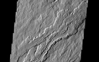 <h1>PIA09145:  Ascraeus Lava</h1><div class="PIA09145" lang="en" style="width:573px;text-align:left;margin:auto;background-color:#000;padding:10px;max-height:150px;overflow:auto;"><p><a href="/figures/PIA09145_fig1.jpg"></a><br><b>Context image for PIA09145<br /> Ascraeus Lava</b></p><p>These lava flows are associated with Ascraeus Mons.<p>Image information: VIS instrument. Latitude 16.4N, Longitude 259.9E. 18 meter/pixel resolution.</p><p>Please see the <a href="http://themis.asu.edu/terms" target="_blank">THEMIS Data Citation Note</a> for details on crediting THEMIS images.</p><p>Note: this THEMIS visual image has not been radiometrically nor geometrically calibrated for this preliminary release. An empirical correction has been performed to remove instrumental effects. A linear shift has been applied in the cross-track and down-track direction to approximate spacecraft and planetary motion. Fully calibrated and geometrically projected images will be released through the Planetary Data System in accordance with Project policies at a later time.</p><p>NASA's Jet Propulsion Laboratory manages the 2001 Mars Odyssey mission for NASA's Office of Space Science, Washington, D.C. The Thermal Emission Imaging System (THEMIS) was developed by Arizona State University, Tempe, in collaboration with Raytheon Santa Barbara Remote Sensing. The THEMIS investigation is led by Dr. Philip Christensen at Arizona State University. Lockheed Martin Astronautics, Denver, is the prime contractor for the Odyssey project, and developed and built the orbiter. Mission operations are conducted jointly from Lockheed Martin and from JPL, a division of the California Institute of Technology in Pasadena.</p><br /><br /><a href="http://photojournal.jpl.nasa.gov/catalog/PIA09145" onclick="window.open(this.href); return false;" title="Voir l'image 	 PIA09145:  Ascraeus Lava	  sur le site de la NASA">Voir l'image 	 PIA09145:  Ascraeus Lava	  sur le site de la NASA.</a></div>