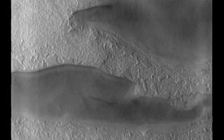 <h1>PIA09271:  South Pole</h1><div class="PIA09271" lang="en" style="width:418px;text-align:left;margin:auto;background-color:#000;padding:10px;max-height:150px;overflow:auto;"><p><a href="/figures/PIA09271_fig1.jpg"></a><br><b>Context image for PIA09271<br />South Pole</b></p><p>This image of the south pole shows different surface textures and darker depression. Layering is visible in the plateau at the top of the image.<p>Image information: VIS instrument. Latitude -86.9N, Longitude 274.8E. 17 meter/pixel resolution.</p><p>Please see the <a href="http://themis.asu.edu/terms" target="_blank">THEMIS Data Citation Note</a> for details on crediting THEMIS images.</p><p>Note: this THEMIS visual image has not been radiometrically nor geometrically calibrated for this preliminary release. An empirical correction has been performed to remove instrumental effects. A linear shift has been applied in the cross-track and down-track direction to approximate spacecraft and planetary motion. Fully calibrated and geometrically projected images will be released through the Planetary Data System in accordance with Project policies at a later time.</p><p>NASA's Jet Propulsion Laboratory manages the 2001 Mars Odyssey mission for NASA's Office of Space Science, Washington, D.C. The Thermal Emission Imaging System (THEMIS) was developed by Arizona State University, Tempe, in collaboration with Raytheon Santa Barbara Remote Sensing. The THEMIS investigation is led by Dr. Philip Christensen at Arizona State University. Lockheed Martin Astronautics, Denver, is the prime contractor for the Odyssey project, and developed and built the orbiter. Mission operations are conducted jointly from Lockheed Martin and from JPL, a division of the California Institute of Technology in Pasadena.</p><br /><br /><a href="http://photojournal.jpl.nasa.gov/catalog/PIA09271" onclick="window.open(this.href); return false;" title="Voir l'image 	 PIA09271:  South Pole	  sur le site de la NASA">Voir l'image 	 PIA09271:  South Pole	  sur le site de la NASA.</a></div>