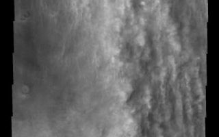 <h1>PIA09290:  Cloud Streamers</h1><div class="PIA09290" lang="en" style="width:421px;text-align:left;margin:auto;background-color:#000;padding:10px;max-height:150px;overflow:auto;"><p><a href="/figures/PIA09290_fig1.jpg"></a><br><b>Context image for PIA09290<br />Cloud Streamers</b></p><p>The vertical features that look like long puffy streamers in this image are actually the clouds at the margin of a large dust storm.<p>Image information: VIS instrument. Latitude -62.5N, Longitude 70.9E. 17 meter/pixel resolution.</p><p>Please see the <a href="http://themis.asu.edu/terms" target="_blank">THEMIS Data Citation Note</a> for details on crediting THEMIS images.</p><p>Note: this THEMIS visual image has not been radiometrically nor geometrically calibrated for this preliminary release. An empirical correction has been performed to remove instrumental effects. A linear shift has been applied in the cross-track and down-track direction to approximate spacecraft and planetary motion. Fully calibrated and geometrically projected images will be released through the Planetary Data System in accordance with Project policies at a later time.</p><p>NASA's Jet Propulsion Laboratory manages the 2001 Mars Odyssey mission for NASA's Office of Space Science, Washington, D.C. The Thermal Emission Imaging System (THEMIS) was developed by Arizona State University, Tempe, in collaboration with Raytheon Santa Barbara Remote Sensing. The THEMIS investigation is led by Dr. Philip Christensen at Arizona State University. Lockheed Martin Astronautics, Denver, is the prime contractor for the Odyssey project, and developed and built the orbiter. Mission operations are conducted jointly from Lockheed Martin and from JPL, a division of the California Institute of Technology in Pasadena.</p><br /><br /><a href="http://photojournal.jpl.nasa.gov/catalog/PIA09290" onclick="window.open(this.href); return false;" title="Voir l'image 	 PIA09290:  Cloud Streamers	  sur le site de la NASA">Voir l'image 	 PIA09290:  Cloud Streamers	  sur le site de la NASA.</a></div>