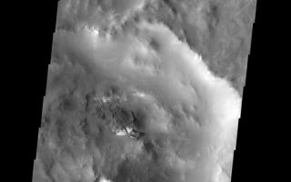 <h1>PIA09295:  Small Dunes</h1><div class="PIA09295" lang="en" style="width:557px;text-align:left;margin:auto;background-color:#000;padding:10px;max-height:150px;overflow:auto;"><p><a href="/figures/PIA09295_fig1.jpg"></a><br><b>Context image for PIA09295<br />Small Dunes</b></p><p>These small dunes are located on the rough floor of an unnamed crater next to the much larger Russell Crater. The bright material on the southern faces of the dunes is frost.<p>Image information: VIS instrument. Latitude -55.3N, Longitude 10.0E. 17 meter/pixel resolution.</p><p>Please see the <a href="http://themis.asu.edu/terms" target="_blank">THEMIS Data Citation Note</a> for details on crediting THEMIS images.</p><p>Note: this THEMIS visual image has not been radiometrically nor geometrically calibrated for this preliminary release. An empirical correction has been performed to remove instrumental effects. A linear shift has been applied in the cross-track and down-track direction to approximate spacecraft and planetary motion. Fully calibrated and geometrically projected images will be released through the Planetary Data System in accordance with Project policies at a later time.</p><p>NASA's Jet Propulsion Laboratory manages the 2001 Mars Odyssey mission for NASA's Office of Space Science, Washington, D.C. The Thermal Emission Imaging System (THEMIS) was developed by Arizona State University, Tempe, in collaboration with Raytheon Santa Barbara Remote Sensing. The THEMIS investigation is led by Dr. Philip Christensen at Arizona State University. Lockheed Martin Astronautics, Denver, is the prime contractor for the Odyssey project, and developed and built the orbiter. Mission operations are conducted jointly from Lockheed Martin and from JPL, a division of the California Institute of Technology in Pasadena.</p><br /><br /><a href="http://photojournal.jpl.nasa.gov/catalog/PIA09295" onclick="window.open(this.href); return false;" title="Voir l'image 	 PIA09295:  Small Dunes	  sur le site de la NASA">Voir l'image 	 PIA09295:  Small Dunes	  sur le site de la NASA.</a></div>