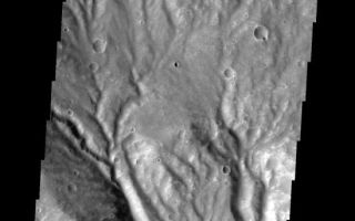 <h1>PIA09431:  Huygens Crater</h1><div class="PIA09431" lang="en" style="width:549px;text-align:left;margin:auto;background-color:#000;padding:10px;max-height:150px;overflow:auto;"><p><a href="/figures/PIA09431_fig1.jpg"></a><br><b>Context image for PIA09431<br />Huygens Crater</b></p><p>This VIS image shows part of the rim of Huygens Crater. The rim is deeply incised with channels.<p>Image information: VIS instrument. Latitude -17.9N, Longitude 59.3E. 17 meter/pixel resolution.</p><p>Please see the <a href="http://themis.asu.edu/terms" target="_blank">THEMIS Data Citation Note</a> for details on crediting THEMIS images.</p><p>Note: this THEMIS visual image has not been radiometrically nor geometrically calibrated for this preliminary release. An empirical correction has been performed to remove instrumental effects. A linear shift has been applied in the cross-track and down-track direction to approximate spacecraft and planetary motion. Fully calibrated and geometrically projected images will be released through the Planetary Data System in accordance with Project policies at a later time.</p><p>NASA's Jet Propulsion Laboratory manages the 2001 Mars Odyssey mission for NASA's Office of Space Science, Washington, D.C. The Thermal Emission Imaging System (THEMIS) was developed by Arizona State University, Tempe, in collaboration with Raytheon Santa Barbara Remote Sensing. The THEMIS investigation is led by Dr. Philip Christensen at Arizona State University. Lockheed Martin Astronautics, Denver, is the prime contractor for the Odyssey project, and developed and built the orbiter. Mission operations are conducted jointly from Lockheed Martin and from JPL, a division of the California Institute of Technology in Pasadena.</p><br /><br /><a href="http://photojournal.jpl.nasa.gov/catalog/PIA09431" onclick="window.open(this.href); return false;" title="Voir l'image 	 PIA09431:  Huygens Crater	  sur le site de la NASA">Voir l'image 	 PIA09431:  Huygens Crater	  sur le site de la NASA.</a></div>