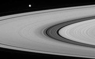 <h1>PIA09750:  Mimas and the Great Division</h1><div class="PIA09750" lang="en" style="width:800px;text-align:left;margin:auto;background-color:#000;padding:10px;max-height:150px;overflow:auto;"><p>Having recently rounded the ansa, or outer edge of the rings, Mimas heads off toward right. This view from the Cassini spacecraft provides a crisp look at the fine material and detailed structure in the Cassini Division that is not readily visible from the Earth. The faint F ring, just visible between Mimas and the A ring, bounds the main rings of Saturn.</p><p>Mimas is 397 kilometers (247 miles) across.</p><p>This view looks toward the sunlit side of the rings from about 4 degrees below the ringplane.</p><p>The image was taken in visible green light with the Cassini spacecraft narrow-angle camera on Sept. 7, 2007. The view was acquired at a distance of approximately 2.9 million kilometers (1.8 million miles) from Saturn. Image scale is 18 kilometers (11 miles) per pixel on Mimas.</p><p>The Cassini-Huygens mission is a cooperative project of NASA, the European Space Agency and the Italian Space Agency. The Jet Propulsion Laboratory, a division of the California Institute of Technology in Pasadena, manages the mission for NASA's Science Mission Directorate, Washington, D.C. The Cassini orbiter and its two onboard cameras were designed, developed and assembled at JPL. The imaging operations center is based at the Space Science Institute in Boulder, Colo.</p><p>For more information about the Cassini-Huygens mission visit <a href="http://saturn.jpl.nasa.gov">http://saturn.jpl.nasa.gov/home/index.cfm</a>. The Cassini imaging team homepage is at <a href="http://ciclops.org">http://ciclops.org</a>.</p><br /><br /><a href="http://photojournal.jpl.nasa.gov/catalog/PIA09750" onclick="window.open(this.href); return false;" title="Voir l'image 	 PIA09750:  Mimas and the Great Division	  sur le site de la NASA">Voir l'image 	 PIA09750:  Mimas and the Great Division	  sur le site de la NASA.</a></div>