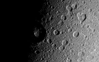 <h1>PIA09830:  Battered Dione</h1><div class="PIA09830" lang="en" style="width:800px;text-align:left;margin:auto;background-color:#000;padding:10px;max-height:150px;overflow:auto;"><p>The Cassini spacecraft looks down over high northern latitudes on Dione. </p><p>The view captures terrain stretching from about 30 degrees south latitude to about 65 degrees north latitude on the moon's Saturn-facing side. Cassini obtained this view from a position 48 degrees above the equator of Dione (1,126 kilometers, or 700 miles across). North is up.</p><p>The image was taken in visible light with the Cassini spacecraft narrow-angle camera on Jan. 3, 2008. The view was acquired at a distance of approximately 129,000 kilometers (80,000 miles) from Dione and at a Sun-Dione-spacecraft, or phase, angle of 87 degrees. Image scale is 767 meters (0.5 mile) per pixel.</p><p>The Cassini-Huygens mission is a cooperative project of NASA, the European Space Agency and the Italian Space Agency. The Jet Propulsion Laboratory, a division of the California Institute of Technology in Pasadena, manages the mission for NASA's Science Mission Directorate, Washington, D.C. The Cassini orbiter and its two onboard cameras were designed, developed and assembled at JPL. The imaging operations center is based at the Space Science Institute in Boulder, Colo.</p><p>For more information about the Cassini-Huygens mission visit <a href="http://saturn.jpl.nasa.gov">http://saturn.jpl.nasa.gov/home/index.cfm</a>. The Cassini imaging team homepage is at <a href="http://ciclops.org">http://ciclops.org</a>.<br /><br /><a href="http://photojournal.jpl.nasa.gov/catalog/PIA09830" onclick="window.open(this.href); return false;" title="Voir l'image 	 PIA09830:  Battered Dione	  sur le site de la NASA">Voir l'image 	 PIA09830:  Battered Dione	  sur le site de la NASA.</a></div>