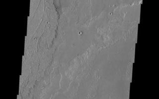 <h1>PIA10028:  Crater Low</h1><div class="PIA10028" lang="en" style="width:500px;text-align:left;margin:auto;background-color:#000;padding:10px;max-height:150px;overflow:auto;"><p><a href="/figures/PIA10028_fig1.jpg"></a><br><b>Context image for PIA10028<br />Crater Low</b></p><p>Just like yesterday's crater, this crater was an obstacle to material flowing around it. In this case the material is lava from the Arsia Mons volcano. The diverted flows formed a downhill "tail" south of the crater. This "tail" is a depression where lava failed to fill in the region behind the crater.<p>Image information: VIS instrument. Latitude -23.3N, Longitude 239.1E. 17 meter/pixel resolution.</p><p>Please see the <a href="http://themis.asu.edu/terms" target="_blank">THEMIS Data Citation Note</a> for details on crediting THEMIS images.</p><p>Note: this THEMIS visual image has not been radiometrically nor geometrically calibrated for this preliminary release. An empirical correction has been performed to remove instrumental effects. A linear shift has been applied in the cross-track and down-track direction to approximate spacecraft and planetary motion. Fully calibrated and geometrically projected images will be released through the Planetary Data System in accordance with Project policies at a later time.</p><p>NASA's Jet Propulsion Laboratory manages the 2001 Mars Odyssey mission for NASA's Office of Space Science, Washington, D.C. The Thermal Emission Imaging System (THEMIS) was developed by Arizona State University, Tempe, in collaboration with Raytheon Santa Barbara Remote Sensing. The THEMIS investigation is led by Dr. Philip Christensen at Arizona State University. Lockheed Martin Astronautics, Denver, is the prime contractor for the Odyssey project, and developed and built the orbiter. Mission operations are conducted jointly from Lockheed Martin and from JPL, a division of the California Institute of Technology in Pasadena.</p><br /><br /><a href="http://photojournal.jpl.nasa.gov/catalog/PIA10028" onclick="window.open(this.href); return false;" title="Voir l'image 	 PIA10028:  Crater Low	  sur le site de la NASA">Voir l'image 	 PIA10028:  Crater Low	  sur le site de la NASA.</a></div>