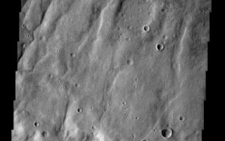 <h1>PIA10038:  Draining the Highland</h1><div class="PIA10038" lang="en" style="width:511px;text-align:left;margin:auto;background-color:#000;padding:10px;max-height:150px;overflow:auto;"><p><a href="/figures/PIA10038_fig1.jpg"></a><br><b>Context image for PIA10038<br />Draining the Highland</b></p><p>Drainage channels completely fill this image. The flow is toward the bottom of the frame, from the highland of Claritas Fossae toward the lowlands of Icaria Planum.<p>Image information: VIS instrument. Latitude 0.0N, Longitude 0.0E. 0 meter/pixel resolution.</p><p>Please see the <a href="http://themis.asu.edu/terms" target="_blank">THEMIS Data Citation Note</a> for details on crediting THEMIS images.</p><p>Note: this THEMIS visual image has not been radiometrically nor geometrically calibrated for this preliminary release. An empirical correction has been performed to remove instrumental effects. A linear shift has been applied in the cross-track and down-track direction to approximate spacecraft and planetary motion. Fully calibrated and geometrically projected images will be released through the Planetary Data System in accordance with Project policies at a later time.</p><p>NASA's Jet Propulsion Laboratory manages the 2001 Mars Odyssey mission for NASA's Office of Space Science, Washington, D.C. The Thermal Emission Imaging System (THEMIS) was developed by Arizona State University, Tempe, in collaboration with Raytheon Santa Barbara Remote Sensing. The THEMIS investigation is led by Dr. Philip Christensen at Arizona State University. Lockheed Martin Astronautics, Denver, is the prime contractor for the Odyssey project, and developed and built the orbiter. Mission operations are conducted jointly from Lockheed Martin and from JPL, a division of the California Institute of Technology in Pasadena.</p><br /><br /><a href="http://photojournal.jpl.nasa.gov/catalog/PIA10038" onclick="window.open(this.href); return false;" title="Voir l'image 	 PIA10038:  Draining the Highland	  sur le site de la NASA">Voir l'image 	 PIA10038:  Draining the Highland	  sur le site de la NASA.</a></div>