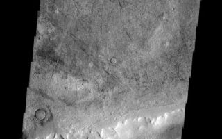 <h1>PIA10047:  Dust Devil Tracks</h1><div class="PIA10047" lang="en" style="width:562px;text-align:left;margin:auto;background-color:#000;padding:10px;max-height:150px;overflow:auto;"><p><a href="/figures/PIA10047_fig1.jpg"></a><br><b>Context image for PIA10047<br />Dust Devil Tracks</b></p><p>Numerous dust devil tracks criss-cross the floor of this unnamed crater east of Kaiser Crater.<p>Image information: VIS instrument. Latitude -46.0N, Longitude 24.8E. 17 meter/pixel resolution.</p><p>Please see the <a href="http://themis.asu.edu/terms" target="_blank">THEMIS Data Citation Note</a> for details on crediting THEMIS images.</p><p>Note: this THEMIS visual image has not been radiometrically nor geometrically calibrated for this preliminary release. An empirical correction has been performed to remove instrumental effects. A linear shift has been applied in the cross-track and down-track direction to approximate spacecraft and planetary motion. Fully calibrated and geometrically projected images will be released through the Planetary Data System in accordance with Project policies at a later time.</p><p>NASA's Jet Propulsion Laboratory manages the 2001 Mars Odyssey mission for NASA's Office of Space Science, Washington, D.C. The Thermal Emission Imaging System (THEMIS) was developed by Arizona State University, Tempe, in collaboration with Raytheon Santa Barbara Remote Sensing. The THEMIS investigation is led by Dr. Philip Christensen at Arizona State University. Lockheed Martin Astronautics, Denver, is the prime contractor for the Odyssey project, and developed and built the orbiter. Mission operations are conducted jointly from Lockheed Martin and from JPL, a division of the California Institute of Technology in Pasadena.</p><br /><br /><a href="http://photojournal.jpl.nasa.gov/catalog/PIA10047" onclick="window.open(this.href); return false;" title="Voir l'image 	 PIA10047:  Dust Devil Tracks	  sur le site de la NASA">Voir l'image 	 PIA10047:  Dust Devil Tracks	  sur le site de la NASA.</a></div>