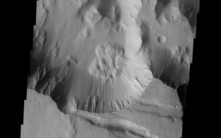 <h1>PIA10049:  Landslide</h1><div class="PIA10049" lang="en" style="width:547px;text-align:left;margin:auto;background-color:#000;padding:10px;max-height:150px;overflow:auto;"><p><a href="/figures/PIA10049_fig1.jpg"></a><br><b>Context image for PIA10049<br />Landslide</b></p><p>This interesting landslide is located on the southern wall of Melas Chasma.<p>Image information: VIS instrument. Latitude -13.6N, Longitude 288.1E. 18 meter/pixel resolution.</p><p>Please see the <a href="http://themis.asu.edu/terms" target="_blank">THEMIS Data Citation Note</a> for details on crediting THEMIS images.</p><p>Note: this THEMIS visual image has not been radiometrically nor geometrically calibrated for this preliminary release. An empirical correction has been performed to remove instrumental effects. A linear shift has been applied in the cross-track and down-track direction to approximate spacecraft and planetary motion. Fully calibrated and geometrically projected images will be released through the Planetary Data System in accordance with Project policies at a later time.</p><p>NASA's Jet Propulsion Laboratory manages the 2001 Mars Odyssey mission for NASA's Office of Space Science, Washington, D.C. The Thermal Emission Imaging System (THEMIS) was developed by Arizona State University, Tempe, in collaboration with Raytheon Santa Barbara Remote Sensing. The THEMIS investigation is led by Dr. Philip Christensen at Arizona State University. Lockheed Martin Astronautics, Denver, is the prime contractor for the Odyssey project, and developed and built the orbiter. Mission operations are conducted jointly from Lockheed Martin and from JPL, a division of the California Institute of Technology in Pasadena.</p><br /><br /><a href="http://photojournal.jpl.nasa.gov/catalog/PIA10049" onclick="window.open(this.href); return false;" title="Voir l'image 	 PIA10049:  Landslide	  sur le site de la NASA">Voir l'image 	 PIA10049:  Landslide	  sur le site de la NASA.</a></div>