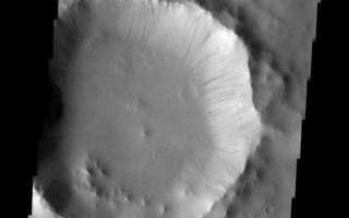 <h1>PIA10055:  Dark Slope Streaks</h1><div class="PIA10055" lang="en" style="width:577px;text-align:left;margin:auto;background-color:#000;padding:10px;max-height:150px;overflow:auto;"><p><a href="/figures/PIA10055_fig1.jpg"></a><br><b>Context image for PIA10055<br />Dark Slope Streaks</b></p><p>The dark slope streaks on the interior rim of this crater in Terra Sabaea mark locations where the upper layer of dust has been removed, exposing the darker rock beneath.<p>Image information: VIS instrument. Latitude 5.3N, Longitude 43.7E. 18 meter/pixel resolution.</p><p>Please see the <a href="http://themis.asu.edu/terms" target="_blank">THEMIS Data Citation Note</a> for details on crediting THEMIS images.</p><p>Note: this THEMIS visual image has not been radiometrically nor geometrically calibrated for this preliminary release. An empirical correction has been performed to remove instrumental effects. A linear shift has been applied in the cross-track and down-track direction to approximate spacecraft and planetary motion. Fully calibrated and geometrically projected images will be released through the Planetary Data System in accordance with Project policies at a later time.</p><p>NASA's Jet Propulsion Laboratory manages the 2001 Mars Odyssey mission for NASA's Office of Space Science, Washington, D.C. The Thermal Emission Imaging System (THEMIS) was developed by Arizona State University, Tempe, in collaboration with Raytheon Santa Barbara Remote Sensing. The THEMIS investigation is led by Dr. Philip Christensen at Arizona State University. Lockheed Martin Astronautics, Denver, is the prime contractor for the Odyssey project, and developed and built the orbiter. Mission operations are conducted jointly from Lockheed Martin and from JPL, a division of the California Institute of Technology in Pasadena.</p><br /><br /><a href="http://photojournal.jpl.nasa.gov/catalog/PIA10055" onclick="window.open(this.href); return false;" title="Voir l'image 	 PIA10055:  Dark Slope Streaks	  sur le site de la NASA">Voir l'image 	 PIA10055:  Dark Slope Streaks	  sur le site de la NASA.</a></div>