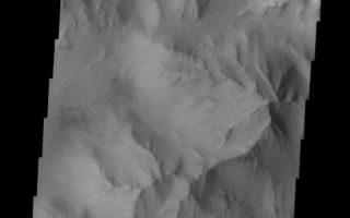 <h1>PIA10061:  Coprates Chasma</h1><div class="PIA10061" lang="en" style="width:545px;text-align:left;margin:auto;background-color:#000;padding:10px;max-height:150px;overflow:auto;"><p><a href="/figures/PIA10061_fig1.jpg"></a><br><b>Context image for PIA10061<br />Coprates Chasma</b></p><p>A landslide is located at the bottom of this image of Coprates Chasma.<p>Image information: VIS instrument. Latitude -13.0N, Longitude 299.6E. 18 meter/pixel resolution.</p><p>Please see the <a href="http://themis.asu.edu/terms" target="_blank">THEMIS Data Citation Note</a> for details on crediting THEMIS images.</p><p>Note: this THEMIS visual image has not been radiometrically nor geometrically calibrated for this preliminary release. An empirical correction has been performed to remove instrumental effects. A linear shift has been applied in the cross-track and down-track direction to approximate spacecraft and planetary motion. Fully calibrated and geometrically projected images will be released through the Planetary Data System in accordance with Project policies at a later time.</p><p>NASA's Jet Propulsion Laboratory manages the 2001 Mars Odyssey mission for NASA's Office of Space Science, Washington, D.C. The Thermal Emission Imaging System (THEMIS) was developed by Arizona State University, Tempe, in collaboration with Raytheon Santa Barbara Remote Sensing. The THEMIS investigation is led by Dr. Philip Christensen at Arizona State University. Lockheed Martin Astronautics, Denver, is the prime contractor for the Odyssey project, and developed and built the orbiter. Mission operations are conducted jointly from Lockheed Martin and from JPL, a division of the California Institute of Technology in Pasadena.</p><br /><br /><a href="http://photojournal.jpl.nasa.gov/catalog/PIA10061" onclick="window.open(this.href); return false;" title="Voir l'image 	 PIA10061:  Coprates Chasma	  sur le site de la NASA">Voir l'image 	 PIA10061:  Coprates Chasma	  sur le site de la NASA.</a></div>