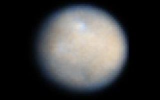 <h1>PIA10235:  Color View of Ceres</h1><div class="PIA10235" lang="en" style="width:250px;text-align:left;margin:auto;background-color:#000;padding:10px;max-height:150px;overflow:auto;"><p>This is a NASA Hubble Space Telescope color image of Ceres, the largest object in the asteroid belt. </p><p>Astronomers enhanced the sharpness in these Advanced Camera for Surveys images to bring out features on Ceres' surface, including brighter and darker regions that could be asteroid impact features. The observations were made in visible and ultraviolet light between December 2003 and January 2004.</p><p>The colors represent the differences between relatively red and blue regions. These differences may simply be due to variation on the surface among different types of material.</p><p>Ceres' round shape suggests that its interior is layered like those of terrestrial planets such as Earth. Ceres may have a rocky inner core, an icy mantle, and a thin, dusty outer crust inferred from its density and rotation rate of 9 hours. Ceres is approximately 590 miles (950 kilometers) across and was first discovered in 1801.<br /><br /><a href="http://photojournal.jpl.nasa.gov/catalog/PIA10235" onclick="window.open(this.href); return false;" title="Voir l'image 	 PIA10235:  Color View of Ceres	  sur le site de la NASA">Voir l'image 	 PIA10235:  Color View of Ceres	  sur le site de la NASA.</a></div>