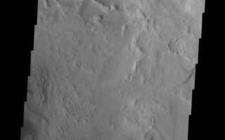 <h1>PIA10271:  Candor Chasma</h1><div class="PIA10271" lang="en" style="width:539px;text-align:left;margin:auto;background-color:#000;padding:10px;max-height:150px;overflow:auto;"><p><a href="/figures/PIA10271_fig1.jpg"></a><br><b>Context image for PIA10271<br />Candor Chasma</b></p><p>This image shows a portion of Candor Chasma, including unusual dark markings on part of the canyon wall.<p>Image information: VIS instrument. Latitude -8.4N, Longitude 294.2E. 18 meter/pixel resolution.</p><p>Please see the <a href="http://themis.asu.edu/terms" target="_blank">THEMIS Data Citation Note</a> for details on crediting THEMIS images.</p><p>Note: this THEMIS visual image has not been radiometrically nor geometrically calibrated for this preliminary release. An empirical correction has been performed to remove instrumental effects. A linear shift has been applied in the cross-track and down-track direction to approximate spacecraft and planetary motion. Fully calibrated and geometrically projected images will be released through the Planetary Data System in accordance with Project policies at a later time.</p><p>NASA's Jet Propulsion Laboratory manages the 2001 Mars Odyssey mission for NASA's Office of Space Science, Washington, D.C. The Thermal Emission Imaging System (THEMIS) was developed by Arizona State University, Tempe, in collaboration with Raytheon Santa Barbara Remote Sensing. The THEMIS investigation is led by Dr. Philip Christensen at Arizona State University. Lockheed Martin Astronautics, Denver, is the prime contractor for the Odyssey project, and developed and built the orbiter. Mission operations are conducted jointly from Lockheed Martin and from JPL, a division of the California Institute of Technology in Pasadena.</p><br /><br /><a href="http://photojournal.jpl.nasa.gov/catalog/PIA10271" onclick="window.open(this.href); return false;" title="Voir l'image 	 PIA10271:  Candor Chasma	  sur le site de la NASA">Voir l'image 	 PIA10271:  Candor Chasma	  sur le site de la NASA.</a></div>