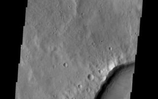 <h1>PIA10272:  Embayment</h1><div class="PIA10272" lang="en" style="width:548px;text-align:left;margin:auto;background-color:#000;padding:10px;max-height:150px;overflow:auto;"><p><a href="/figures/PIA10272_fig1.jpg"></a><br><b>Context image for PIA10272<br />Embayment</b></p><p>This crater west of Claritas Fossae contains internal fractures that have been partially filled by a later deposit. This embayment indicates that the fracturing occurred prior to the deposition of the layer of material.<p>Image information: VIS instrument. Latitude -35.5N, Longitude 245.2E. 17 meter/pixel resolution.</p><p>Please see the <a href="http://themis.asu.edu/terms" target="_blank">THEMIS Data Citation Note</a> for details on crediting THEMIS images.</p><p>Note: this THEMIS visual image has not been radiometrically nor geometrically calibrated for this preliminary release. An empirical correction has been performed to remove instrumental effects. A linear shift has been applied in the cross-track and down-track direction to approximate spacecraft and planetary motion. Fully calibrated and geometrically projected images will be released through the Planetary Data System in accordance with Project policies at a later time.</p><p>NASA's Jet Propulsion Laboratory manages the 2001 Mars Odyssey mission for NASA's Office of Space Science, Washington, D.C. The Thermal Emission Imaging System (THEMIS) was developed by Arizona State University, Tempe, in collaboration with Raytheon Santa Barbara Remote Sensing. The THEMIS investigation is led by Dr. Philip Christensen at Arizona State University. Lockheed Martin Astronautics, Denver, is the prime contractor for the Odyssey project, and developed and built the orbiter. Mission operations are conducted jointly from Lockheed Martin and from JPL, a division of the California Institute of Technology in Pasadena.</p><br /><br /><a href="http://photojournal.jpl.nasa.gov/catalog/PIA10272" onclick="window.open(this.href); return false;" title="Voir l'image 	 PIA10272:  Embayment	  sur le site de la NASA">Voir l'image 	 PIA10272:  Embayment	  sur le site de la NASA.</a></div>