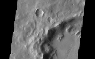 <h1>PIA10273:  Channel to Ridge</h1><div class="PIA10273" lang="en" style="width:533px;text-align:left;margin:auto;background-color:#000;padding:10px;max-height:150px;overflow:auto;"><p><a href="/figures/PIA10273_fig1.jpg"></a><br><b>Context image for PIA10273<br />Channel to Ridge</b></p><p>This VIS image illustrates one of the complexities of studying Mars. The small channel that enters the crater appears to become a ridge as it crosses onto the crater floor. This inversion of topography is due to several processes. Initially the channel would have carved into the crater rim and onto the floor. At some time material infilled the channel on the floor of the crater. This infilling material is more resistant to erosion than the surrounding material that has subsequently been removed. So the channel fill now is topographically a ridge, but is located where the original channel cut into the crater.<p>Image information: VIS instrument. Latitude -35.6N, Longitude 242.8E. 17 meter/pixel resolution.</p><p>Please see the <a href="http://themis.asu.edu/terms" target="_blank">THEMIS Data Citation Note</a> for details on crediting THEMIS images.</p><p>Note: this THEMIS visual image has not been radiometrically nor geometrically calibrated for this preliminary release. An empirical correction has been performed to remove instrumental effects. A linear shift has been applied in the cross-track and down-track direction to approximate spacecraft and planetary motion. Fully calibrated and geometrically projected images will be released through the Planetary Data System in accordance with Project policies at a later time.</p><p>NASA's Jet Propulsion Laboratory manages the 2001 Mars Odyssey mission for NASA's Office of Space Science, Washington, D.C. The Thermal Emission Imaging System (THEMIS) was developed by Arizona State University, Tempe, in collaboration with Raytheon Santa Barbara Remote Sensing. The THEMIS investigation is led by Dr. Philip Christensen at Arizona State University. Lockheed Martin Astronautics, Denver, is the prime contractor for the Odyssey project, and developed and built the orbiter. Mission operations are conducted jointly from Lockheed Martin and from JPL, a division of the California Institute of Technology in Pasadena.</p><br /><br /><a href="http://photojournal.jpl.nasa.gov/catalog/PIA10273" onclick="window.open(this.href); return false;" title="Voir l'image 	 PIA10273:  Channel to Ridge	  sur le site de la NASA">Voir l'image 	 PIA10273:  Channel to Ridge	  sur le site de la NASA.</a></div>