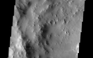 <h1>PIA10277:  Dark Slope Streaks</h1><div class="PIA10277" lang="en" style="width:574px;text-align:left;margin:auto;background-color:#000;padding:10px;max-height:150px;overflow:auto;"><p><a href="/figures/PIA10277_fig1.jpg"></a><br><b>Context image for PIA10277<br />Dark Slope Streaks</b></p><p>The western rim of this crater contains multiple groups of dark slope streaks. These streaks are created when surface dust slides downward, revealing the darker material beneath.<p>Image information: VIS instrument. Latitude 9.1N, Longitude 39.7E. 18 meter/pixel resolution.</p><p>Please see the <a href="http://themis.asu.edu/terms" target="_blank">THEMIS Data Citation Note</a> for details on crediting THEMIS images.</p><p>Note: this THEMIS visual image has not been radiometrically nor geometrically calibrated for this preliminary release. An empirical correction has been performed to remove instrumental effects. A linear shift has been applied in the cross-track and down-track direction to approximate spacecraft and planetary motion. Fully calibrated and geometrically projected images will be released through the Planetary Data System in accordance with Project policies at a later time.</p><p>NASA's Jet Propulsion Laboratory manages the 2001 Mars Odyssey mission for NASA's Office of Space Science, Washington, D.C. The Thermal Emission Imaging System (THEMIS) was developed by Arizona State University, Tempe, in collaboration with Raytheon Santa Barbara Remote Sensing. The THEMIS investigation is led by Dr. Philip Christensen at Arizona State University. Lockheed Martin Astronautics, Denver, is the prime contractor for the Odyssey project, and developed and built the orbiter. Mission operations are conducted jointly from Lockheed Martin and from JPL, a division of the California Institute of Technology in Pasadena.</p><br /><br /><a href="http://photojournal.jpl.nasa.gov/catalog/PIA10277" onclick="window.open(this.href); return false;" title="Voir l'image 	 PIA10277:  Dark Slope Streaks	  sur le site de la NASA">Voir l'image 	 PIA10277:  Dark Slope Streaks	  sur le site de la NASA.</a></div>