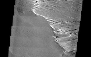 <h1>PIA10302:  Windblown Region</h1><div class="PIA10302" lang="en" style="width:571px;text-align:left;margin:auto;background-color:#000;padding:10px;max-height:150px;overflow:auto;"><p><a href="/figures/PIA10302_fig1.jpg"></a><br><b>Context image for PIA10302<br />Windblown Region</b></p><p>Located near Amazonis Mensa, this region show in this VIS image has undergone considerable erosion due to blowing winds.<p>Image information: VIS instrument. Latitude -3.5N, Longitude 218.9E. 18 meter/pixel resolution.</p><p>Please see the <a href="http://themis.asu.edu/terms" target="_blank">THEMIS Data Citation Note</a> for details on crediting THEMIS images.</p><p>Note: this THEMIS visual image has not been radiometrically nor geometrically calibrated for this preliminary release. An empirical correction has been performed to remove instrumental effects. A linear shift has been applied in the cross-track and down-track direction to approximate spacecraft and planetary motion. Fully calibrated and geometrically projected images will be released through the Planetary Data System in accordance with Project policies at a later time.</p><p>NASA's Jet Propulsion Laboratory manages the 2001 Mars Odyssey mission for NASA's Office of Space Science, Washington, D.C. The Thermal Emission Imaging System (THEMIS) was developed by Arizona State University, Tempe, in collaboration with Raytheon Santa Barbara Remote Sensing. The THEMIS investigation is led by Dr. Philip Christensen at Arizona State University. Lockheed Martin Astronautics, Denver, is the prime contractor for the Odyssey project, and developed and built the orbiter. Mission operations are conducted jointly from Lockheed Martin and from JPL, a division of the California Institute of Technology in Pasadena.<br /><br /><a href="http://photojournal.jpl.nasa.gov/catalog/PIA10302" onclick="window.open(this.href); return false;" title="Voir l'image 	 PIA10302:  Windblown Region	  sur le site de la NASA">Voir l'image 	 PIA10302:  Windblown Region	  sur le site de la NASA.</a></div>