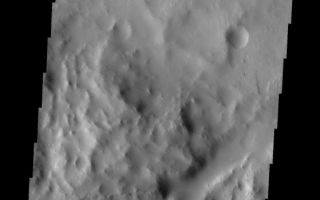 <h1>PIA10316:  More Dark Slope Streaks</h1><div class="PIA10316" lang="en" style="width:559px;text-align:left;margin:auto;background-color:#000;padding:10px;max-height:150px;overflow:auto;"><p><a href="/figures/PIA10316_fig1.jpg"></a><br><b>Context image for PIA10316<br />More Dark Slope Streaks</b></p><p>Tracing the downward motion of dust, dark streaks are present on the interior rim of this unusual crater within Tikhonravov Crater.<p>Image information: VIS instrument. Latitude 11.0N, Longitude 35.4E. 18 meter/pixel resolution.</p><p>Please see the <a href="http://themis.asu.edu/terms" target="_blank">THEMIS Data Citation Note</a> for details on crediting THEMIS images.</p><p>Note: this THEMIS visual image has not been radiometrically nor geometrically calibrated for this preliminary release. An empirical correction has been performed to remove instrumental effects. A linear shift has been applied in the cross-track and down-track direction to approximate spacecraft and planetary motion. Fully calibrated and geometrically projected images will be released through the Planetary Data System in accordance with Project policies at a later time.</p><p>NASA's Jet Propulsion Laboratory manages the 2001 Mars Odyssey mission for NASA's Office of Space Science, Washington, D.C. The Thermal Emission Imaging System (THEMIS) was developed by Arizona State University, Tempe, in collaboration with Raytheon Santa Barbara Remote Sensing. The THEMIS investigation is led by Dr. Philip Christensen at Arizona State University. Lockheed Martin Astronautics, Denver, is the prime contractor for the Odyssey project, and developed and built the orbiter. Mission operations are conducted jointly from Lockheed Martin and from JPL, a division of the California Institute of Technology in Pasadena.<br /><br /><a href="http://photojournal.jpl.nasa.gov/catalog/PIA10316" onclick="window.open(this.href); return false;" title="Voir l'image 	 PIA10316:  More Dark Slope Streaks	  sur le site de la NASA">Voir l'image 	 PIA10316:  More Dark Slope Streaks	  sur le site de la NASA.</a></div>
