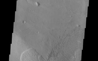 <h1>PIA10324:  Coprates Chasma</h1><div class="PIA10324" lang="en" style="width:553px;text-align:left;margin:auto;background-color:#000;padding:10px;max-height:150px;overflow:auto;"><p><a href="/figures/PIA10324_fig1.jpg"></a><br><b>Context image for PIA10324<br />Coprates Chasma</b></p><p>This VIS image of Coprates Chasma contains a landslide deposit and multiple dunes.<p>Image information: VIS instrument. Latitude -15.0N, Longitude 304.1E. 18 meter/pixel resolution.</p><p>Please see the <a href="http://themis.asu.edu/terms" target="_blank">THEMIS Data Citation Note</a> for details on crediting THEMIS images.</p><p>Note: this THEMIS visual image has not been radiometrically nor geometrically calibrated for this preliminary release. An empirical correction has been performed to remove instrumental effects. A linear shift has been applied in the cross-track and down-track direction to approximate spacecraft and planetary motion. Fully calibrated and geometrically projected images will be released through the Planetary Data System in accordance with Project policies at a later time.</p><p>NASA's Jet Propulsion Laboratory manages the 2001 Mars Odyssey mission for NASA's Office of Space Science, Washington, D.C. The Thermal Emission Imaging System (THEMIS) was developed by Arizona State University, Tempe, in collaboration with Raytheon Santa Barbara Remote Sensing. The THEMIS investigation is led by Dr. Philip Christensen at Arizona State University. Lockheed Martin Astronautics, Denver, is the prime contractor for the Odyssey project, and developed and built the orbiter. Mission operations are conducted jointly from Lockheed Martin and from JPL, a division of the California Institute of Technology in Pasadena.<br /><br /><a href="http://photojournal.jpl.nasa.gov/catalog/PIA10324" onclick="window.open(this.href); return false;" title="Voir l'image 	 PIA10324:  Coprates Chasma	  sur le site de la NASA">Voir l'image 	 PIA10324:  Coprates Chasma	  sur le site de la NASA.</a></div>
