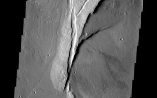 <h1>PIA10344:  Jovis Tholus</h1><div class="PIA10344" lang="en" style="width:560px;text-align:left;margin:auto;background-color:#000;padding:10px;max-height:150px;overflow:auto;"><p><a href="/figures/PIA10344_fig1.jpg"></a><br><b>Context image for PIA10344<br />Jovis Tholus</b></p><p>Jovis Tholus is a small volcano in the Tharsis region of Mars. The western part of the volcano has collapsed.<p>Image information: VIS instrument. Latitude 18.3N, Longitude 242.2E. 18 meter/pixel resolution.</p><p>Please see the <a href="http://themis.asu.edu/terms" target="_blank">THEMIS Data Citation Note</a> for details on crediting THEMIS images.</p><p>Note: this THEMIS visual image has not been radiometrically nor geometrically calibrated for this preliminary release. An empirical correction has been performed to remove instrumental effects. A linear shift has been applied in the cross-track and down-track direction to approximate spacecraft and planetary motion. Fully calibrated and geometrically projected images will be released through the Planetary Data System in accordance with Project policies at a later time.</p><p>NASA's Jet Propulsion Laboratory manages the 2001 Mars Odyssey mission for NASA's Office of Space Science, Washington, D.C. The Thermal Emission Imaging System (THEMIS) was developed by Arizona State University, Tempe, in collaboration with Raytheon Santa Barbara Remote Sensing. The THEMIS investigation is led by Dr. Philip Christensen at Arizona State University. Lockheed Martin Astronautics, Denver, is the prime contractor for the Odyssey project, and developed and built the orbiter. Mission operations are conducted jointly from Lockheed Martin and from JPL, a division of the California Institute of Technology in Pasadena.<br /><br /><a href="http://photojournal.jpl.nasa.gov/catalog/PIA10344" onclick="window.open(this.href); return false;" title="Voir l'image 	 PIA10344:  Jovis Tholus	  sur le site de la NASA">Voir l'image 	 PIA10344:  Jovis Tholus	  sur le site de la NASA.</a></div>