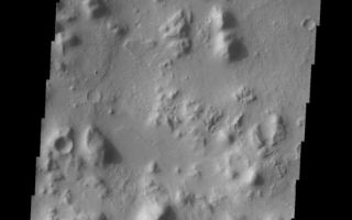 <h1>PIA10800:  Tartarus Montes</h1><div class="PIA10800" lang="en" style="width:559px;text-align:left;margin:auto;background-color:#000;padding:10px;max-height:150px;overflow:auto;"><p><a href="/figures/PIA10800_fig1.jpg"></a><br><b>Context image for PIA10800<br />Tartarus Montes</b></p><p>Tartarus Montes is a group of low hills located between Orcus Patera and the Elysium volcanic region. Many fractures, like the one seen in this VIS image, cut the Tartarus Montes running radial to the Elysium volcanic center.<p>Image information: VIS instrument. Latitude 14.6N, Longitude 164.5E. 18 meter/pixel resolution.</p><p>Please see the <a href="http://themis.asu.edu/terms" target="_blank">THEMIS Data Citation Note</a> for details on crediting THEMIS images.</p><p>Note: this THEMIS visual image has not been radiometrically nor geometrically calibrated for this preliminary release. An empirical correction has been performed to remove instrumental effects. A linear shift has been applied in the cross-track and down-track direction to approximate spacecraft and planetary motion. Fully calibrated and geometrically projected images will be released through the Planetary Data System in accordance with Project policies at a later time.</p><p>NASA's Jet Propulsion Laboratory manages the 2001 Mars Odyssey mission for NASA's Office of Space Science, Washington, D.C. The Thermal Emission Imaging System (THEMIS) was developed by Arizona State University, Tempe, in collaboration with Raytheon Santa Barbara Remote Sensing. The THEMIS investigation is led by Dr. Philip Christensen at Arizona State University. Lockheed Martin Astronautics, Denver, is the prime contractor for the Odyssey project, and developed and built the orbiter. Mission operations are conducted jointly from Lockheed Martin and from JPL, a division of the California Institute of Technology in Pasadena.<br /><br /><a href="http://photojournal.jpl.nasa.gov/catalog/PIA10800" onclick="window.open(this.href); return false;" title="Voir l'image 	 PIA10800:  Tartarus Montes	  sur le site de la NASA">Voir l'image 	 PIA10800:  Tartarus Montes	  sur le site de la NASA.</a></div>
