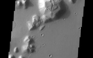 <h1>PIA10804:  Slope Streaks</h1><div class="PIA10804" lang="en" style="width:556px;text-align:left;margin:auto;background-color:#000;padding:10px;max-height:150px;overflow:auto;"><p><a href="/figures/PIA10804_fig1.jpg"></a><br><b>Context image for PIA10804<br />Slope Streaks</b></p><p>Dark slope streaks are located on this small mesa in southern Amazonis Planitia.<p>Image information: VIS instrument. Latitude 4.8N, Longitude 189.5E. 18 meter/pixel resolution.</p><p>Please see the <a href="http://themis.asu.edu/terms" target="_blank">THEMIS Data Citation Note</a> for details on crediting THEMIS images.</p><p>Note: this THEMIS visual image has not been radiometrically nor geometrically calibrated for this preliminary release. An empirical correction has been performed to remove instrumental effects. A linear shift has been applied in the cross-track and down-track direction to approximate spacecraft and planetary motion. Fully calibrated and geometrically projected images will be released through the Planetary Data System in accordance with Project policies at a later time.</p><p>NASA's Jet Propulsion Laboratory manages the 2001 Mars Odyssey mission for NASA's Office of Space Science, Washington, D.C. The Thermal Emission Imaging System (THEMIS) was developed by Arizona State University, Tempe, in collaboration with Raytheon Santa Barbara Remote Sensing. The THEMIS investigation is led by Dr. Philip Christensen at Arizona State University. Lockheed Martin Astronautics, Denver, is the prime contractor for the Odyssey project, and developed and built the orbiter. Mission operations are conducted jointly from Lockheed Martin and from JPL, a division of the California Institute of Technology in Pasadena.<br /><br /><a href="http://photojournal.jpl.nasa.gov/catalog/PIA10804" onclick="window.open(this.href); return false;" title="Voir l'image 	 PIA10804:  Slope Streaks	  sur le site de la NASA">Voir l'image 	 PIA10804:  Slope Streaks	  sur le site de la NASA.</a></div>