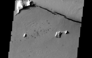 <h1>PIA10806:  Cerberus Fossae</h1><div class="PIA10806" lang="en" style="width:556px;text-align:left;margin:auto;background-color:#000;padding:10px;max-height:150px;overflow:auto;"><p><a href="/figures/PIA10806_fig1.jpg"></a><br><b>Context image for PIA10806<br />Cerberus Fossae</b></p><p>Cerberus Fossae is comprised of several long fractures radial to the Elysium Volcanic complex. This fracture appears to have been a vent for some of the local lava flows.<p>Image information: VIS instrument. Latitude 8.0N, Longitude 161.1E. 18 meter/pixel resolution.</p><p>Please see the <a href="http://themis.asu.edu/terms" target="_blank">THEMIS Data Citation Note</a> for details on crediting THEMIS images.</p><p>Note: this THEMIS visual image has not been radiometrically nor geometrically calibrated for this preliminary release. An empirical correction has been performed to remove instrumental effects. A linear shift has been applied in the cross-track and down-track direction to approximate spacecraft and planetary motion. Fully calibrated and geometrically projected images will be released through the Planetary Data System in accordance with Project policies at a later time.</p><p>NASA's Jet Propulsion Laboratory manages the 2001 Mars Odyssey mission for NASA's Office of Space Science, Washington, D.C. The Thermal Emission Imaging System (THEMIS) was developed by Arizona State University, Tempe, in collaboration with Raytheon Santa Barbara Remote Sensing. The THEMIS investigation is led by Dr. Philip Christensen at Arizona State University. Lockheed Martin Astronautics, Denver, is the prime contractor for the Odyssey project, and developed and built the orbiter. Mission operations are conducted jointly from Lockheed Martin and from JPL, a division of the California Institute of Technology in Pasadena.<br /><br /><a href="http://photojournal.jpl.nasa.gov/catalog/PIA10806" onclick="window.open(this.href); return false;" title="Voir l'image 	 PIA10806:  Cerberus Fossae	  sur le site de la NASA">Voir l'image 	 PIA10806:  Cerberus Fossae	  sur le site de la NASA.</a></div>