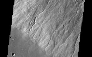 <h1>PIA10808:  Hecates Tholus</h1><div class="PIA10808" lang="en" style="width:588px;text-align:left;margin:auto;background-color:#000;padding:10px;max-height:150px;overflow:auto;"><p><a href="/figures/PIA10808_fig1.jpg"></a><br><b>Context image for PIA10808<br />Hecates Tholus</b></p><p>This image shows were the southwest flank of Hecates Tholus meets ground level. Hecates Tholus is one of the three major volcanoes that make up the Elysium Volcanic complex.<p>Image information: VIS instrument. Latitude 30.9N, Longitude 149.2E. 19 meter/pixel resolution.</p><p>Please see the <a href="http://themis.asu.edu/terms" target="_blank">THEMIS Data Citation Note</a> for details on crediting THEMIS images.</p><p>Note: this THEMIS visual image has not been radiometrically nor geometrically calibrated for this preliminary release. An empirical correction has been performed to remove instrumental effects. A linear shift has been applied in the cross-track and down-track direction to approximate spacecraft and planetary motion. Fully calibrated and geometrically projected images will be released through the Planetary Data System in accordance with Project policies at a later time.</p><p>NASA's Jet Propulsion Laboratory manages the 2001 Mars Odyssey mission for NASA's Office of Space Science, Washington, D.C. The Thermal Emission Imaging System (THEMIS) was developed by Arizona State University, Tempe, in collaboration with Raytheon Santa Barbara Remote Sensing. The THEMIS investigation is led by Dr. Philip Christensen at Arizona State University. Lockheed Martin Astronautics, Denver, is the prime contractor for the Odyssey project, and developed and built the orbiter. Mission operations are conducted jointly from Lockheed Martin and from JPL, a division of the California Institute of Technology in Pasadena.<br /><br /><a href="http://photojournal.jpl.nasa.gov/catalog/PIA10808" onclick="window.open(this.href); return false;" title="Voir l'image 	 PIA10808:  Hecates Tholus	  sur le site de la NASA">Voir l'image 	 PIA10808:  Hecates Tholus	  sur le site de la NASA.</a></div>