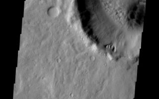 <h1>PIA10812:  Gullies</h1><div class="PIA10812" lang="en" style="width:578px;text-align:left;margin:auto;background-color:#000;padding:10px;max-height:150px;overflow:auto;"><p><a href="/figures/PIA10812_fig1.jpg"></a><br><b>Context image for PIA10812<br />Gullies</b></p><p>Several gullies are located on the rim of this unnamed crater located on the margin between Tempe Terra and Acidalia Planitia.<p>Image information: VIS instrument. Latitude 46.7N, Longitude 307.5E. 19 meter/pixel resolution.</p><p>Please see the <a href="http://themis.asu.edu/terms" target="_blank">THEMIS Data Citation Note</a> for details on crediting THEMIS images.</p><p>Note: this THEMIS visual image has not been radiometrically nor geometrically calibrated for this preliminary release. An empirical correction has been performed to remove instrumental effects. A linear shift has been applied in the cross-track and down-track direction to approximate spacecraft and planetary motion. Fully calibrated and geometrically projected images will be released through the Planetary Data System in accordance with Project policies at a later time.</p><p>NASA's Jet Propulsion Laboratory manages the 2001 Mars Odyssey mission for NASA's Office of Space Science, Washington, D.C. The Thermal Emission Imaging System (THEMIS) was developed by Arizona State University, Tempe, in collaboration with Raytheon Santa Barbara Remote Sensing. The THEMIS investigation is led by Dr. Philip Christensen at Arizona State University. Lockheed Martin Astronautics, Denver, is the prime contractor for the Odyssey project, and developed and built the orbiter. Mission operations are conducted jointly from Lockheed Martin and from JPL, a division of the California Institute of Technology in Pasadena.<br /><br /><a href="http://photojournal.jpl.nasa.gov/catalog/PIA10812" onclick="window.open(this.href); return false;" title="Voir l'image 	 PIA10812:  Gullies	  sur le site de la NASA">Voir l'image 	 PIA10812:  Gullies	  sur le site de la NASA.</a></div>