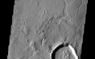 <h1>PIA10815:  Channel and Graben</h1><div class="PIA10815" lang="en" style="width:600px;text-align:left;margin:auto;background-color:#000;padding:10px;max-height:150px;overflow:auto;"><p><a href="/figures/PIA10815_fig1.jpg"></a><br><b>Context image for PIA10815<br />Channel and Graben</b></p><p>This image of Tempe Terra contains northward flowing channels and a graben running ENE to WSW. When the intersection of the large channel and the graben is examined it shows that the fracturing that created the graben postdates the channel.<p>Image information: VIS instrument. Latitude 43.4N, Longitude 304.4E. 19 meter/pixel resolution.</p><p>Please see the <a href="http://themis.asu.edu/terms" target="_blank">THEMIS Data Citation Note</a> for details on crediting THEMIS images.</p><p>Note: this THEMIS visual image has not been radiometrically nor geometrically calibrated for this preliminary release. An empirical correction has been performed to remove instrumental effects. A linear shift has been applied in the cross-track and down-track direction to approximate spacecraft and planetary motion. Fully calibrated and geometrically projected images will be released through the Planetary Data System in accordance with Project policies at a later time.</p><p>NASA's Jet Propulsion Laboratory manages the 2001 Mars Odyssey mission for NASA's Office of Space Science, Washington, D.C. The Thermal Emission Imaging System (THEMIS) was developed by Arizona State University, Tempe, in collaboration with Raytheon Santa Barbara Remote Sensing. The THEMIS investigation is led by Dr. Philip Christensen at Arizona State University. Lockheed Martin Astronautics, Denver, is the prime contractor for the Odyssey project, and developed and built the orbiter. Mission operations are conducted jointly from Lockheed Martin and from JPL, a division of the California Institute of Technology in Pasadena.<br /><br /><a href="http://photojournal.jpl.nasa.gov/catalog/PIA10815" onclick="window.open(this.href); return false;" title="Voir l'image 	 PIA10815:  Channel and Graben	  sur le site de la NASA">Voir l'image 	 PIA10815:  Channel and Graben	  sur le site de la NASA.</a></div>