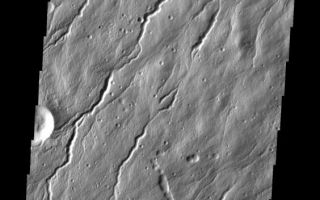 <h1>PIA10826:  Hecates Channels</h1><div class="PIA10826" lang="en" style="width:564px;text-align:left;margin:auto;background-color:#000;padding:10px;max-height:150px;overflow:auto;"><p><a href="/figures/PIA10826_fig1.jpg"></a><br><b>Context image for PIA10826<br />Hecates Channels</b></p><p>This image of Hecates Tholus, the northernmost of the Elysium volcanoes, shows many channels.<p>Image information: VIS instrument. Latitude 32.6N, Longitude 150.9E. 19 meter/pixel resolution.</p><p>Please see the <a href="http://themis.asu.edu/terms" target="_blank">THEMIS Data Citation Note</a> for details on crediting THEMIS images.</p><p>Note: this THEMIS visual image has not been radiometrically nor geometrically calibrated for this preliminary release. An empirical correction has been performed to remove instrumental effects. A linear shift has been applied in the cross-track and down-track direction to approximate spacecraft and planetary motion. Fully calibrated and geometrically projected images will be released through the Planetary Data System in accordance with Project policies at a later time.</p><p>NASA's Jet Propulsion Laboratory manages the 2001 Mars Odyssey mission for NASA's Office of Space Science, Washington, D.C. The Thermal Emission Imaging System (THEMIS) was developed by Arizona State University, Tempe, in collaboration with Raytheon Santa Barbara Remote Sensing. The THEMIS investigation is led by Dr. Philip Christensen at Arizona State University. Lockheed Martin Astronautics, Denver, is the prime contractor for the Odyssey project, and developed and built the orbiter. Mission operations are conducted jointly from Lockheed Martin and from JPL, a division of the California Institute of Technology in Pasadena.<br /><br /><a href="http://photojournal.jpl.nasa.gov/catalog/PIA10826" onclick="window.open(this.href); return false;" title="Voir l'image 	 PIA10826:  Hecates Channels	  sur le site de la NASA">Voir l'image 	 PIA10826:  Hecates Channels	  sur le site de la NASA.</a></div>