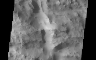 <h1>PIA10845:  Dark Streaks</h1><div class="PIA10845" lang="en" style="width:563px;text-align:left;margin:auto;background-color:#000;padding:10px;max-height:150px;overflow:auto;"><p><a href="/figures/PIA10845_fig1.jpg"></a><br><b>Context image for PIA10845<br />Dark Streaks</b></p><p>Dark, slope steaks are common in the heavily fractured material found to the north and west of Olympus Mons.<p>Image information: VIS instrument. Latitude 29.8N, Longitude 227.1E. 19 meter/pixel resolution.</p><p>Please see the <a href="http://themis.asu.edu/terms" target="_blank">THEMIS Data Citation Note</a> for details on crediting THEMIS images.</p><p>Note: this THEMIS visual image has not been radiometrically nor geometrically calibrated for this preliminary release. An empirical correction has been performed to remove instrumental effects. A linear shift has been applied in the cross-track and down-track direction to approximate spacecraft and planetary motion. Fully calibrated and geometrically projected images will be released through the Planetary Data System in accordance with Project policies at a later time.</p><p>NASA's Jet Propulsion Laboratory manages the 2001 Mars Odyssey mission for NASA's Office of Space Science, Washington, D.C. The Thermal Emission Imaging System (THEMIS) was developed by Arizona State University, Tempe, in collaboration with Raytheon Santa Barbara Remote Sensing. The THEMIS investigation is led by Dr. Philip Christensen at Arizona State University. Lockheed Martin Astronautics, Denver, is the prime contractor for the Odyssey project, and developed and built the orbiter. Mission operations are conducted jointly from Lockheed Martin and from JPL, a division of the California Institute of Technology in Pasadena.<br /><br /><a href="http://photojournal.jpl.nasa.gov/catalog/PIA10845" onclick="window.open(this.href); return false;" title="Voir l'image 	 PIA10845:  Dark Streaks	  sur le site de la NASA">Voir l'image 	 PIA10845:  Dark Streaks	  sur le site de la NASA.</a></div>