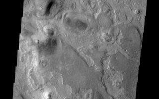 <h1>PIA10849:  Northern Layers</h1><div class="PIA10849" lang="en" style="width:575px;text-align:left;margin:auto;background-color:#000;padding:10px;max-height:150px;overflow:auto;"><p><a href="/figures/PIA10849_fig1.jpg"></a><br><b>Context image for PIA10849<br />Northern Layers</b></p><p>Many regions in the northern plains show evidence of layered materials.<p>Image information: VIS instrument. Latitude 50.3N, Longitude 60.1E. 19 meter/pixel resolution.</p><p>Please see the <a href="http://themis.asu.edu/terms" target="_blank">THEMIS Data Citation Note</a> for details on crediting THEMIS images.</p><p>Note: this THEMIS visual image has not been radiometrically nor geometrically calibrated for this preliminary release. An empirical correction has been performed to remove instrumental effects. A linear shift has been applied in the cross-track and down-track direction to approximate spacecraft and planetary motion. Fully calibrated and geometrically projected images will be released through the Planetary Data System in accordance with Project policies at a later time.</p><p>NASA's Jet Propulsion Laboratory manages the 2001 Mars Odyssey mission for NASA's Office of Space Science, Washington, D.C. The Thermal Emission Imaging System (THEMIS) was developed by Arizona State University, Tempe, in collaboration with Raytheon Santa Barbara Remote Sensing. The THEMIS investigation is led by Dr. Philip Christensen at Arizona State University. Lockheed Martin Astronautics, Denver, is the prime contractor for the Odyssey project, and developed and built the orbiter. Mission operations are conducted jointly from Lockheed Martin and from JPL, a division of the California Institute of Technology in Pasadena.<br /><br /><a href="http://photojournal.jpl.nasa.gov/catalog/PIA10849" onclick="window.open(this.href); return false;" title="Voir l'image 	 PIA10849:  Northern Layers	  sur le site de la NASA">Voir l'image 	 PIA10849:  Northern Layers	  sur le site de la NASA.</a></div>