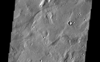 <h1>PIA10855:  Tempe Terra</h1><div class="PIA10855" lang="en" style="width:568px;text-align:left;margin:auto;background-color:#000;padding:10px;max-height:150px;overflow:auto;"><p><a href="/figures/PIA10855_fig1.jpg"></a><br><b>Context image for PIA10855<br />Tempe Terra</b></p><p>The eastern margin of Tempe Terra is dissected by channels of many sizes, like the one at the top of this image.<p>Image information: VIS instrument. Latitude 43.6N, Longitude 295.8E. 19 meter/pixel resolution.</p><p>Please see the <a href="http://themis.asu.edu/terms" target="_blank">THEMIS Data Citation Note</a> for details on crediting THEMIS images.</p><p>Note: this THEMIS visual image has not been radiometrically nor geometrically calibrated for this preliminary release. An empirical correction has been performed to remove instrumental effects. A linear shift has been applied in the cross-track and down-track direction to approximate spacecraft and planetary motion. Fully calibrated and geometrically projected images will be released through the Planetary Data System in accordance with Project policies at a later time.</p><p>NASA's Jet Propulsion Laboratory manages the 2001 Mars Odyssey mission for NASA's Office of Space Science, Washington, D.C. The Thermal Emission Imaging System (THEMIS) was developed by Arizona State University, Tempe, in collaboration with Raytheon Santa Barbara Remote Sensing. The THEMIS investigation is led by Dr. Philip Christensen at Arizona State University. Lockheed Martin Astronautics, Denver, is the prime contractor for the Odyssey project, and developed and built the orbiter. Mission operations are conducted jointly from Lockheed Martin and from JPL, a division of the California Institute of Technology in Pasadena.<br /><br /><a href="http://photojournal.jpl.nasa.gov/catalog/PIA10855" onclick="window.open(this.href); return false;" title="Voir l'image 	 PIA10855:  Tempe Terra	  sur le site de la NASA">Voir l'image 	 PIA10855:  Tempe Terra	  sur le site de la NASA.</a></div>