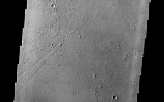 <h1>PIA10856:  Big Blast</h1><div class="PIA10856" lang="en" style="width:576px;text-align:left;margin:auto;background-color:#000;padding:10px;max-height:150px;overflow:auto;"><p><a href="/figures/PIA10856_fig1.jpg"></a><br><b>Context image for PIA10856<br />Big Blast</b></p><p>East of Jovis Tholus and in the midst of the Tharsis Volcanic field this dark, rayed spot is seen. Most likely this mark represents the shock wave of an incoming meteoroid that burned up before impact. The shock wave blasted the fine material away, leaving the darker basaltic surface exposed.<p>Image information: VIS instrument. Latitude 17.3N, Longitude 246.5E. 18 meter/pixel resolution.</p><p>Please see the <a href="http://themis.asu.edu/terms" target="_blank">THEMIS Data Citation Note</a> for details on crediting THEMIS images.</p><p>Note: this THEMIS visual image has not been radiometrically nor geometrically calibrated for this preliminary release. An empirical correction has been performed to remove instrumental effects. A linear shift has been applied in the cross-track and down-track direction to approximate spacecraft and planetary motion. Fully calibrated and geometrically projected images will be released through the Planetary Data System in accordance with Project policies at a later time.</p><p>NASA's Jet Propulsion Laboratory manages the 2001 Mars Odyssey mission for NASA's Office of Space Science, Washington, D.C. The Thermal Emission Imaging System (THEMIS) was developed by Arizona State University, Tempe, in collaboration with Raytheon Santa Barbara Remote Sensing. The THEMIS investigation is led by Dr. Philip Christensen at Arizona State University. Lockheed Martin Astronautics, Denver, is the prime contractor for the Odyssey project, and developed and built the orbiter. Mission operations are conducted jointly from Lockheed Martin and from JPL, a division of the California Institute of Technology in Pasadena.<br /><br /><a href="http://photojournal.jpl.nasa.gov/catalog/PIA10856" onclick="window.open(this.href); return false;" title="Voir l'image 	 PIA10856:  Big Blast	  sur le site de la NASA">Voir l'image 	 PIA10856:  Big Blast	  sur le site de la NASA.</a></div>